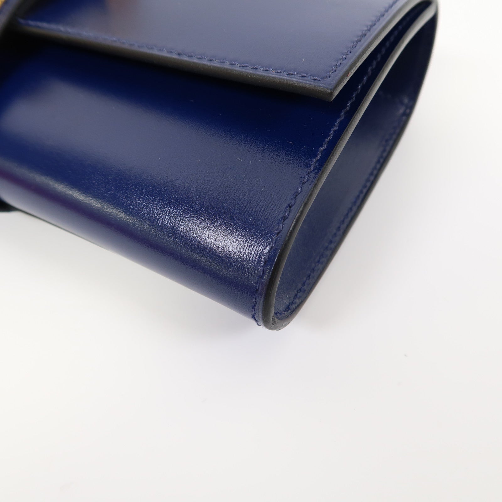 HERMES Tadelakt皮革Medor Clutch金扣手拿包寶石藍色