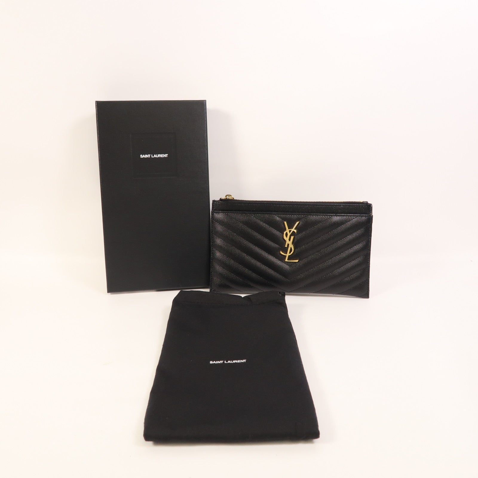 YVES SAINT LAURENT 牛皮皮革Pouch金扣手拿包