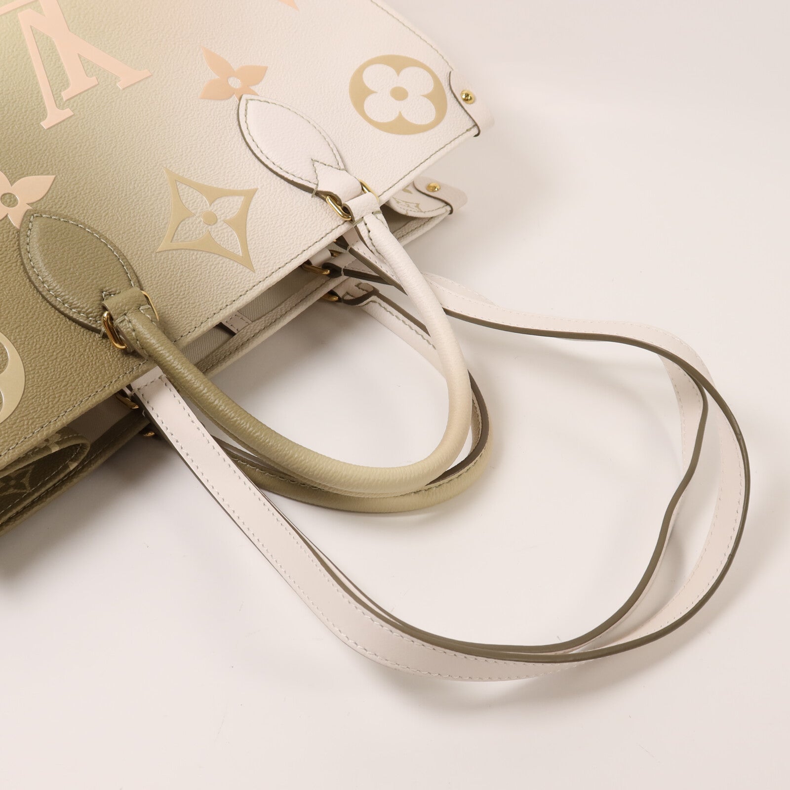 LOUIS VUITTON Monogram Empreinte Gradient On the Go MM金扣手挽肩背兩用袋