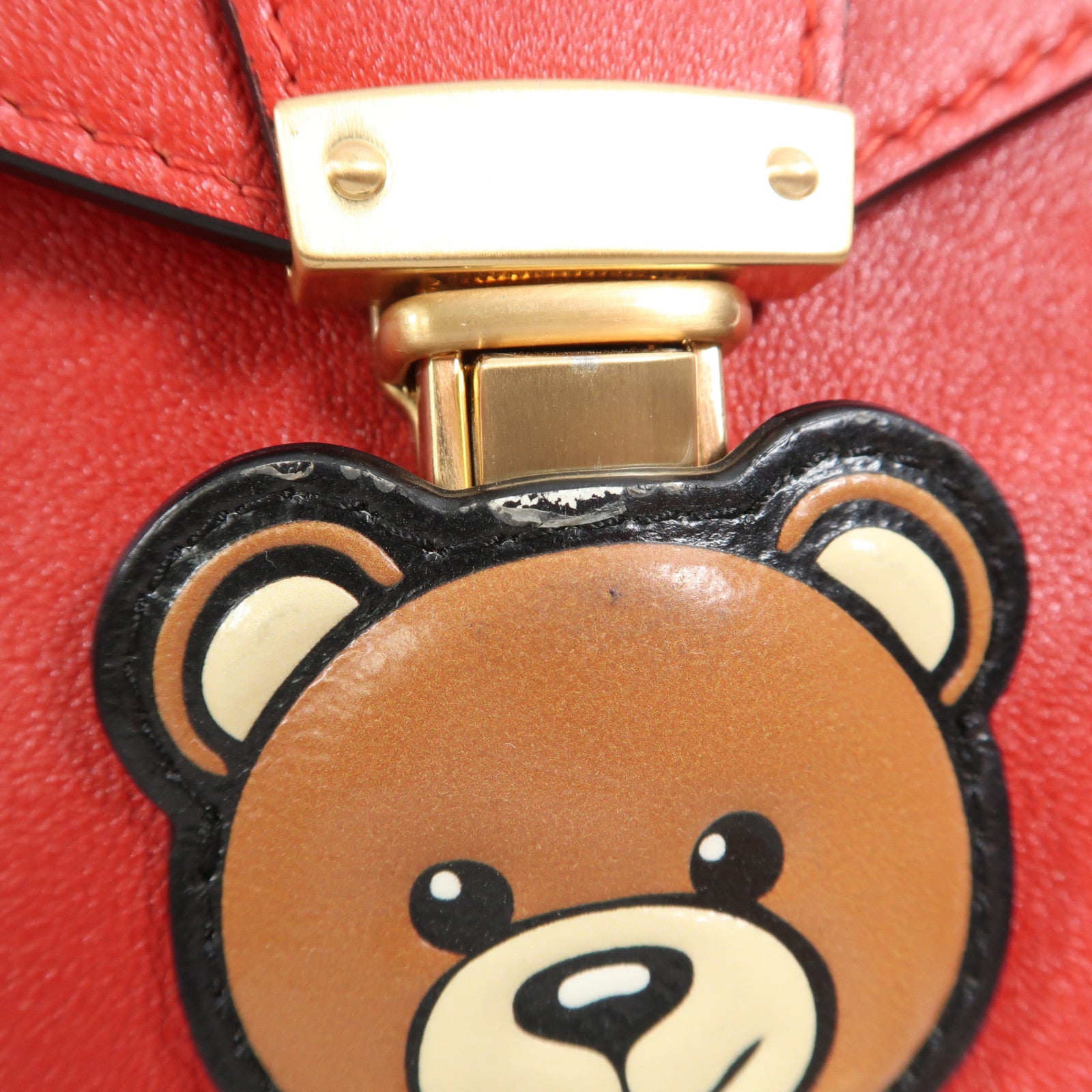 MOSCHINO 【激減優惠】牛皮皮革Pouch金扣手拿包紅色