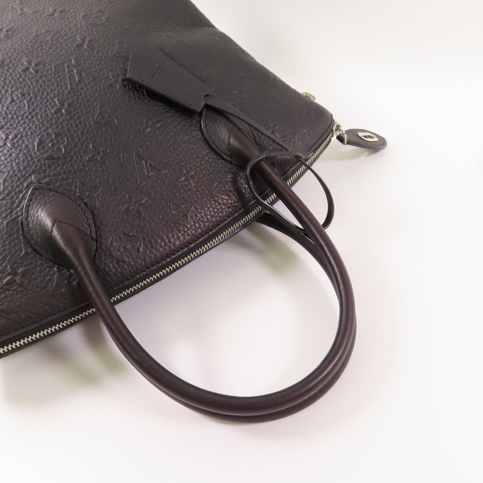 LOUIS VUITTON 【激減優惠】牛皮皮革Revelation Lockit銀扣手挽袋