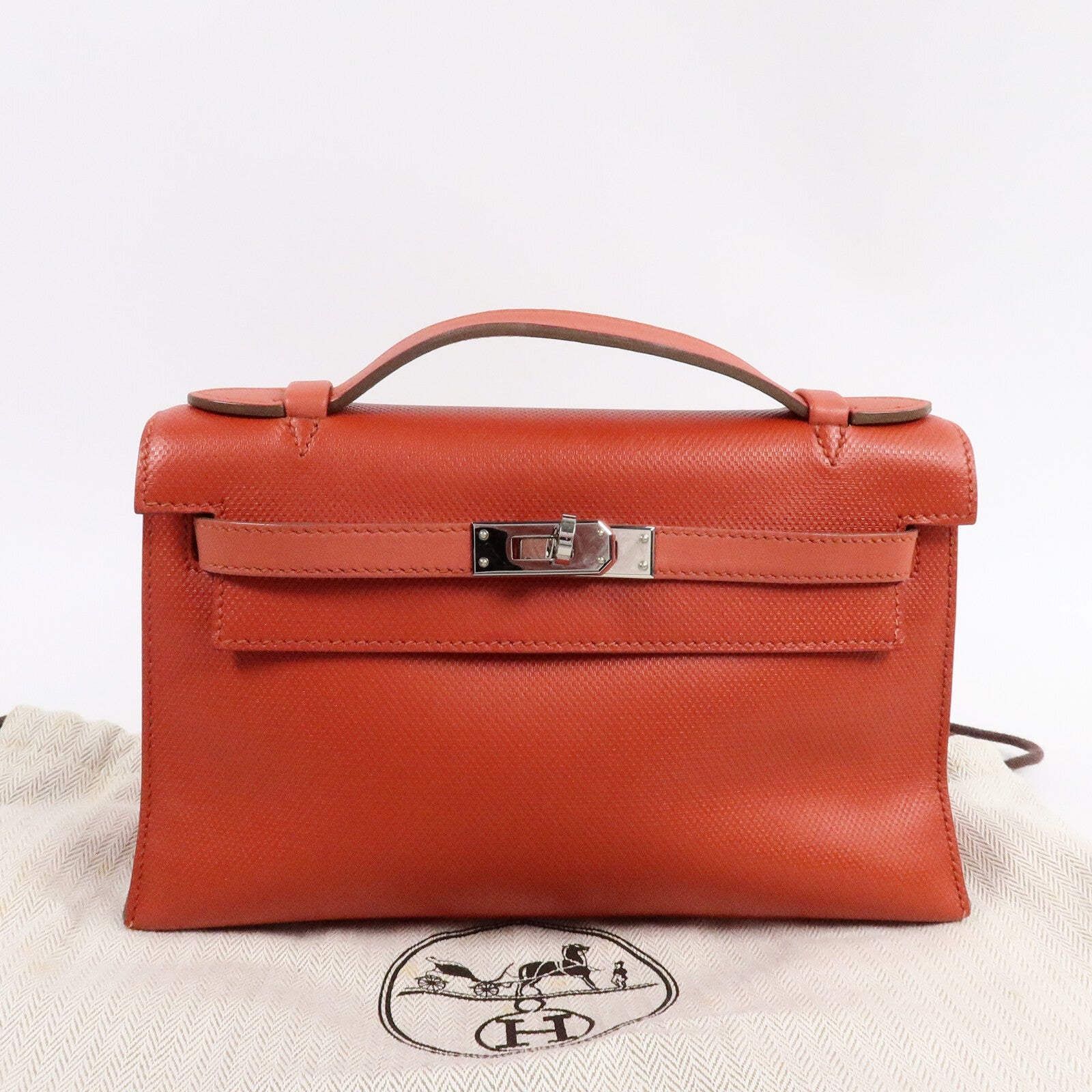 HERMES Swift皮革Kelly Pochette手挽袋Capucine/Rouge Pivo