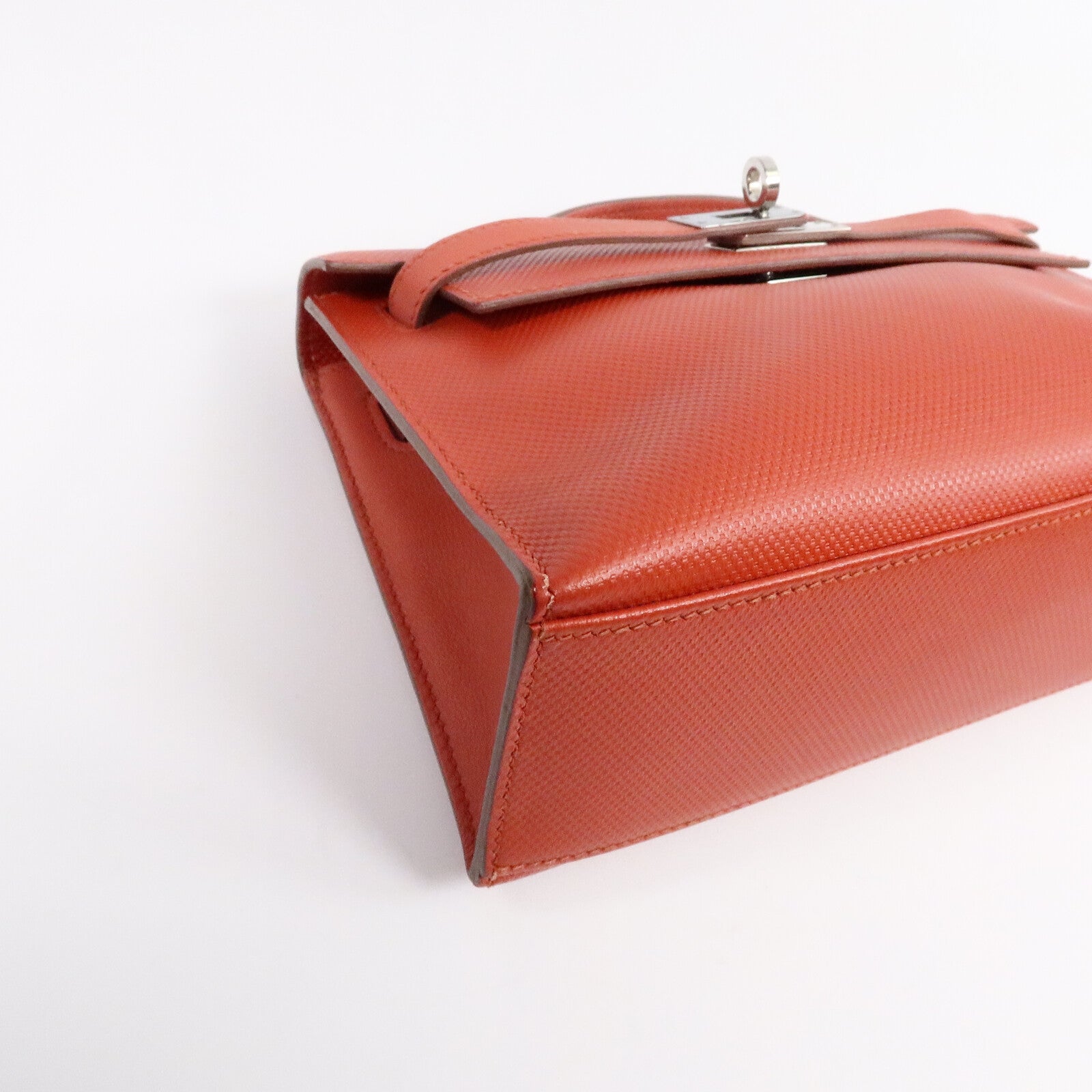 HERMES Swift皮革Kelly Pochette手挽袋Capucine/Rouge Pivo