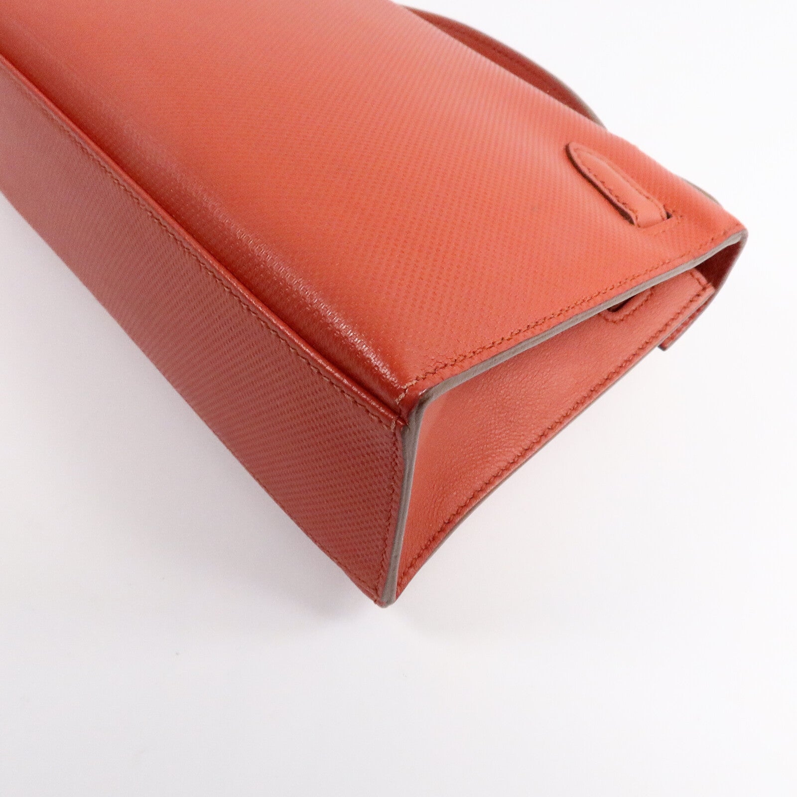 HERMES Swift皮革Kelly Pochette手挽袋Capucine/Rouge Pivo