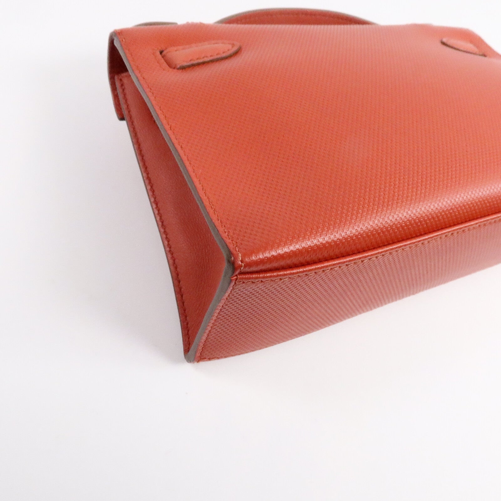 HERMES Swift皮革Kelly Pochette手挽袋Capucine/Rouge Pivo
