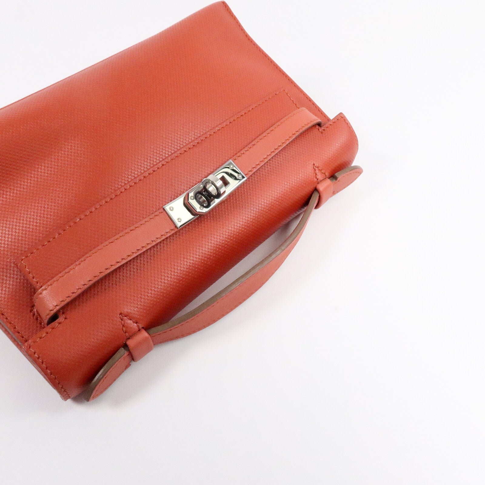 HERMES Swift皮革Kelly Pochette手挽袋Capucine/Rouge Pivo