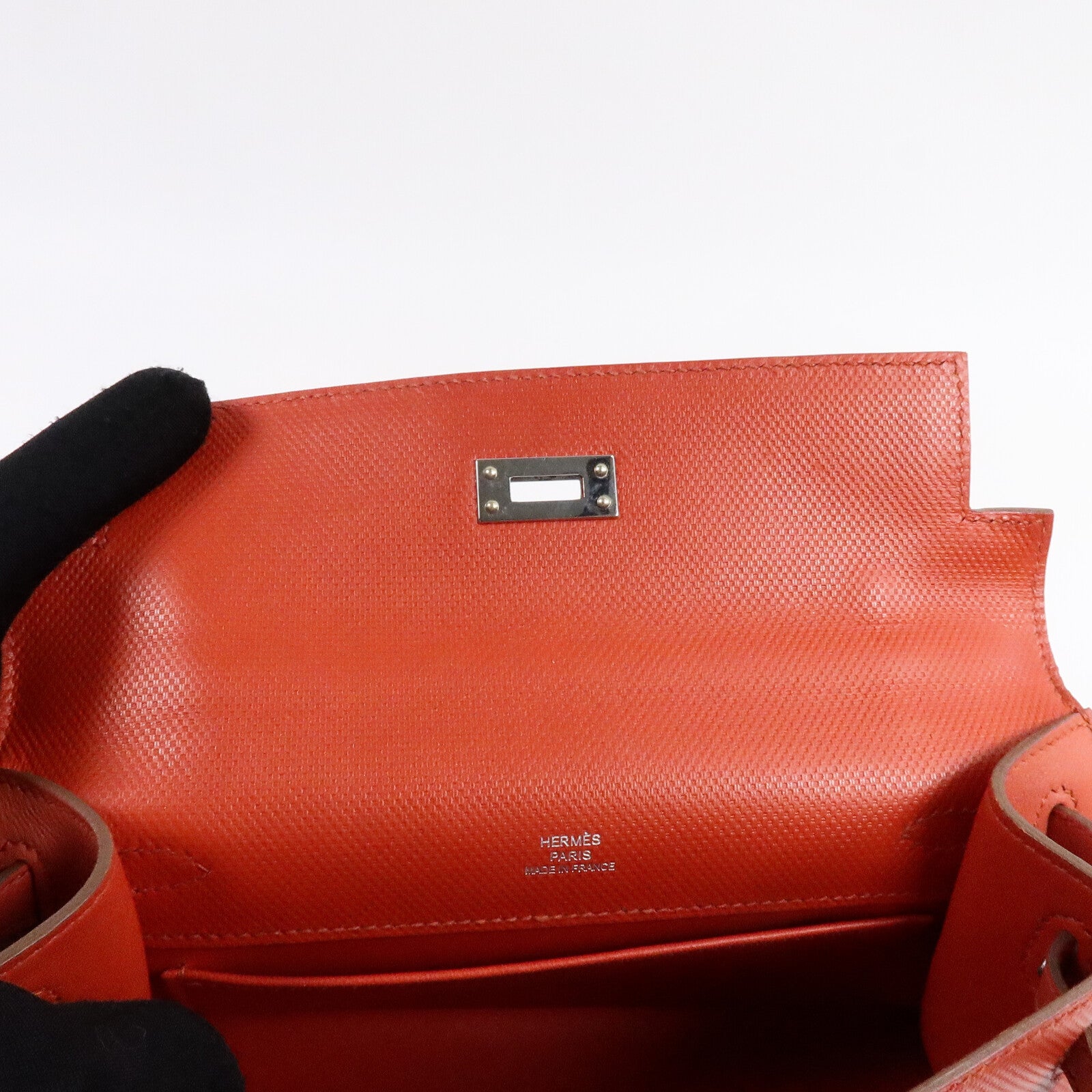 HERMES Swift皮革Kelly Pochette手挽袋Capucine/Rouge Pivo