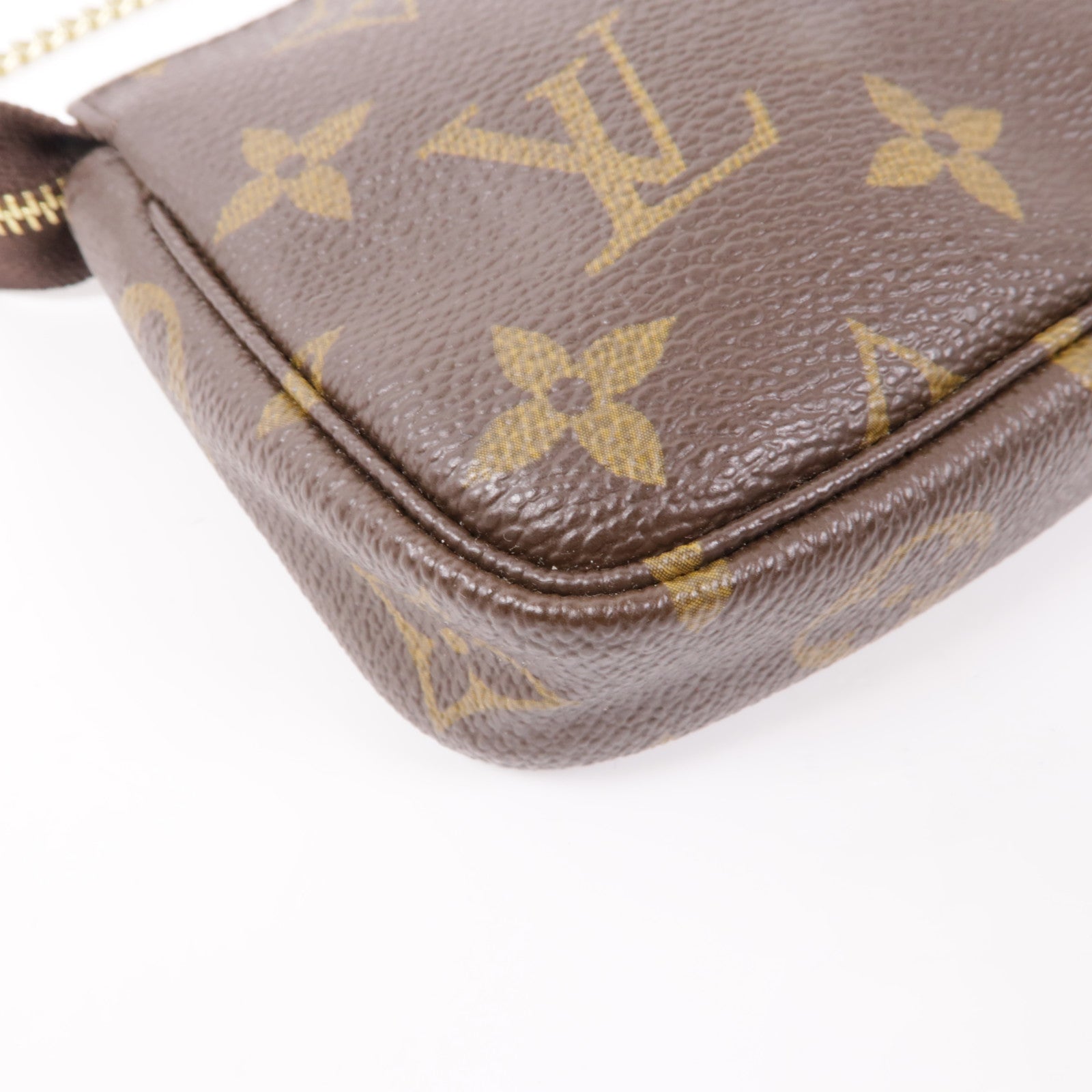 LOUIS VUITTON Monogram Mini Pochette Accessoires金扣手挽袋棕色