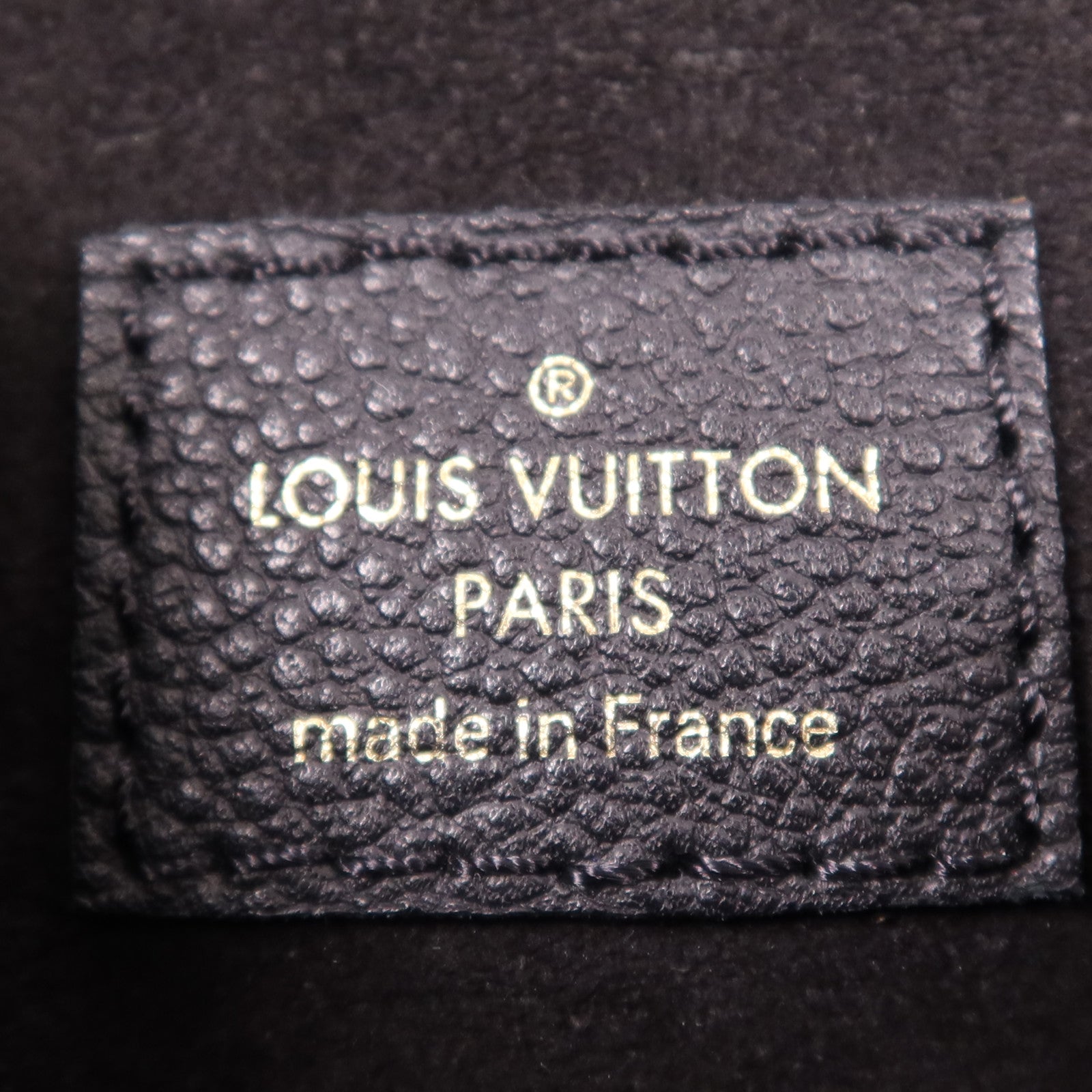 LOUIS VUITTON Monogram Empreinte Tiny Backpack金扣背包