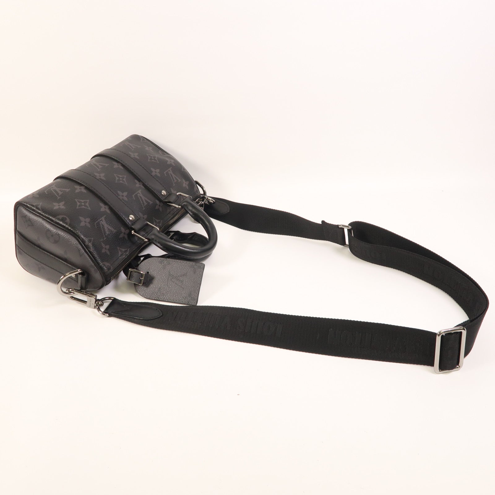 LOUIS VUITTON Monogram Eclipse Reverse Keepall Bandouliere 25銀扣手挽肩背兩用袋