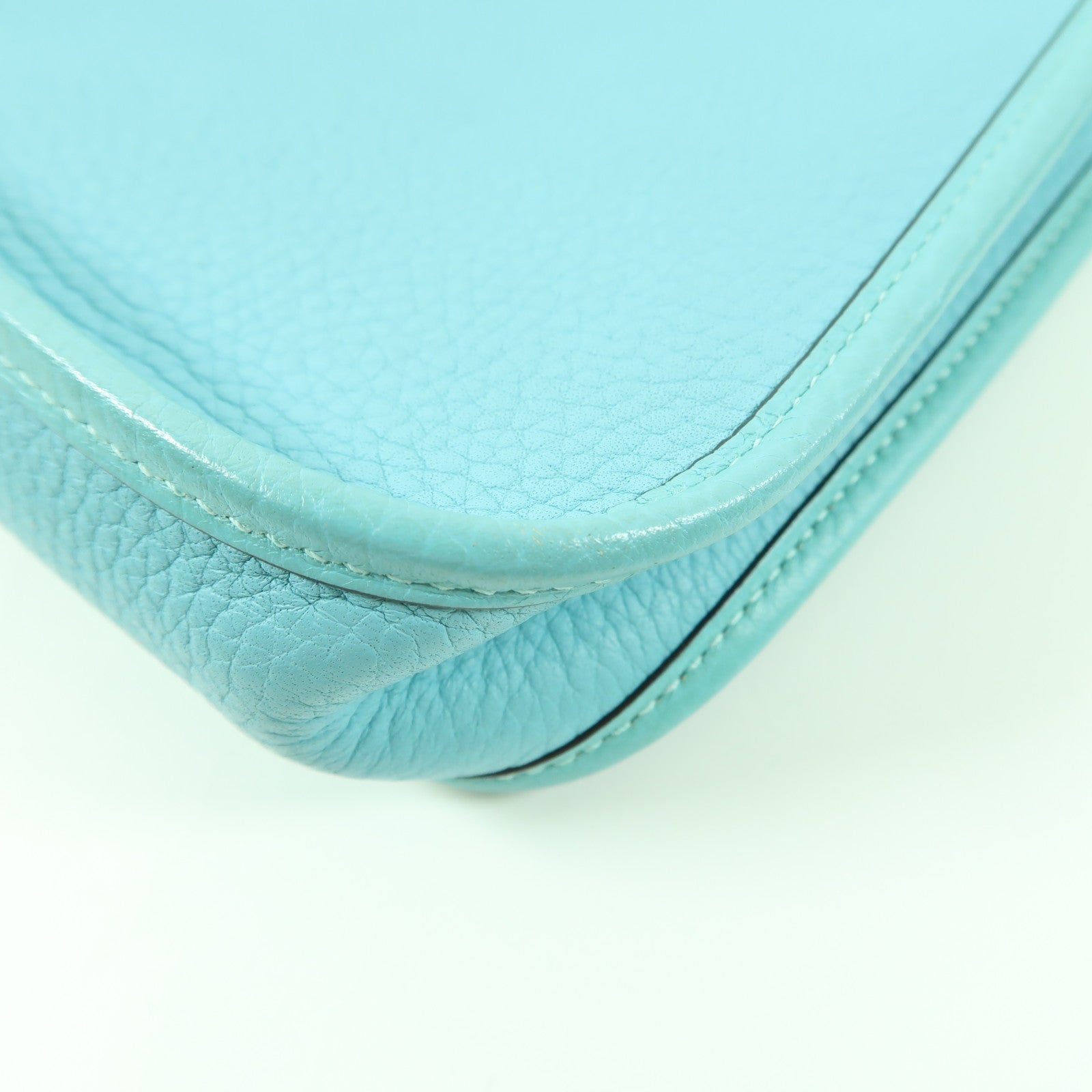 HERMES Clemence皮革Mini Evelyne TPM銀扣肩背袋Bleu Atoll/綠松石色