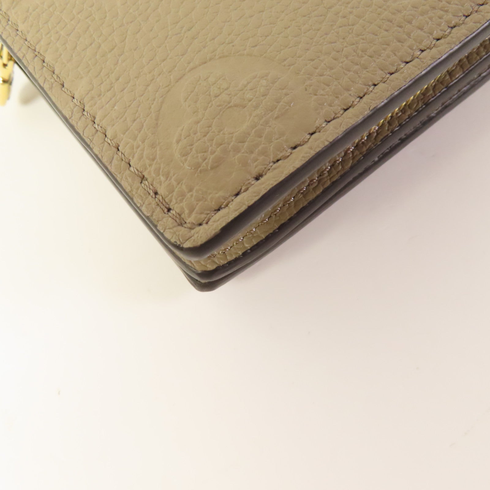LOUIS VUITTON Clea Wallet Monogram-Empreinte Beige M80152