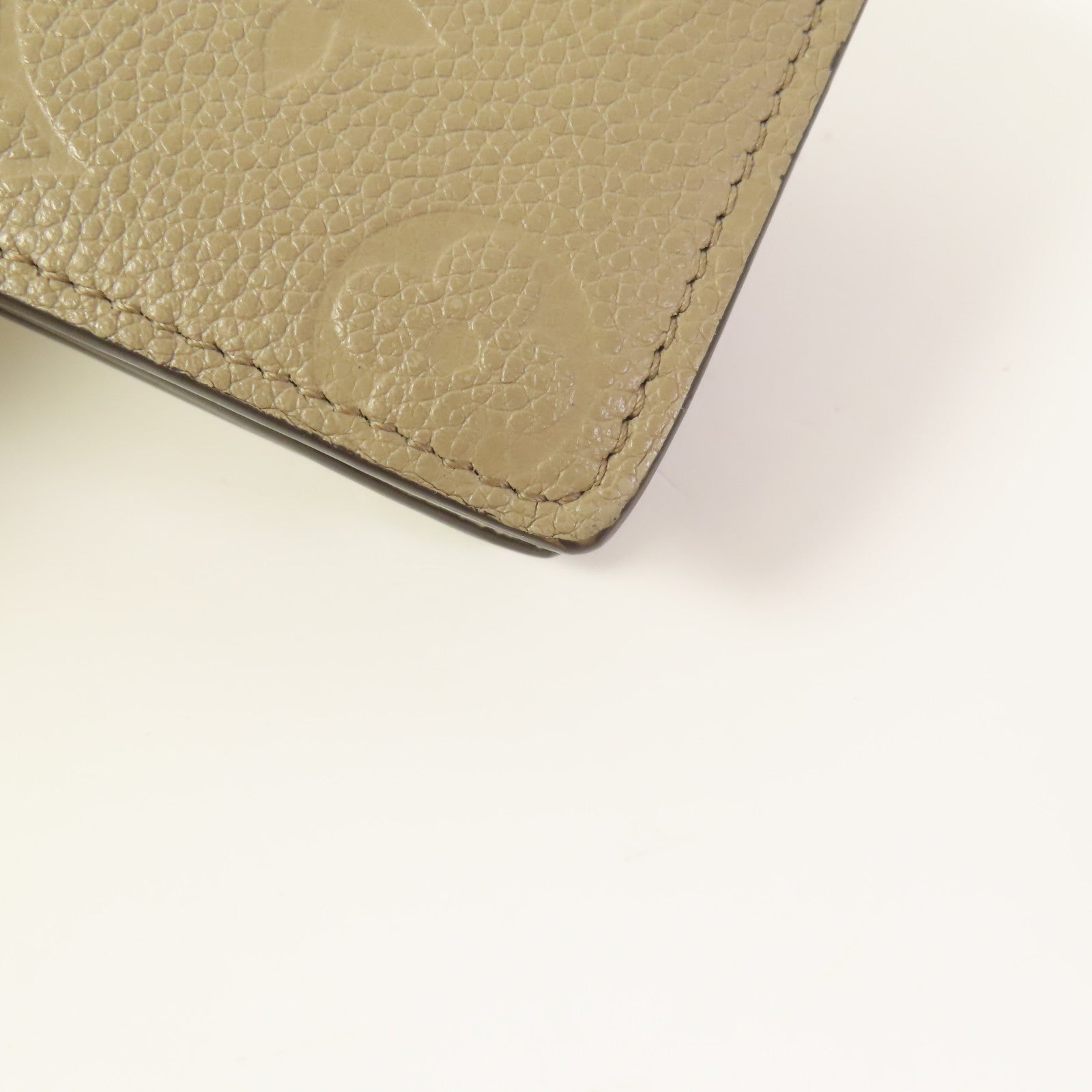 LOUIS VUITTON Clea Wallet Monogram-Empreinte Beige M80152