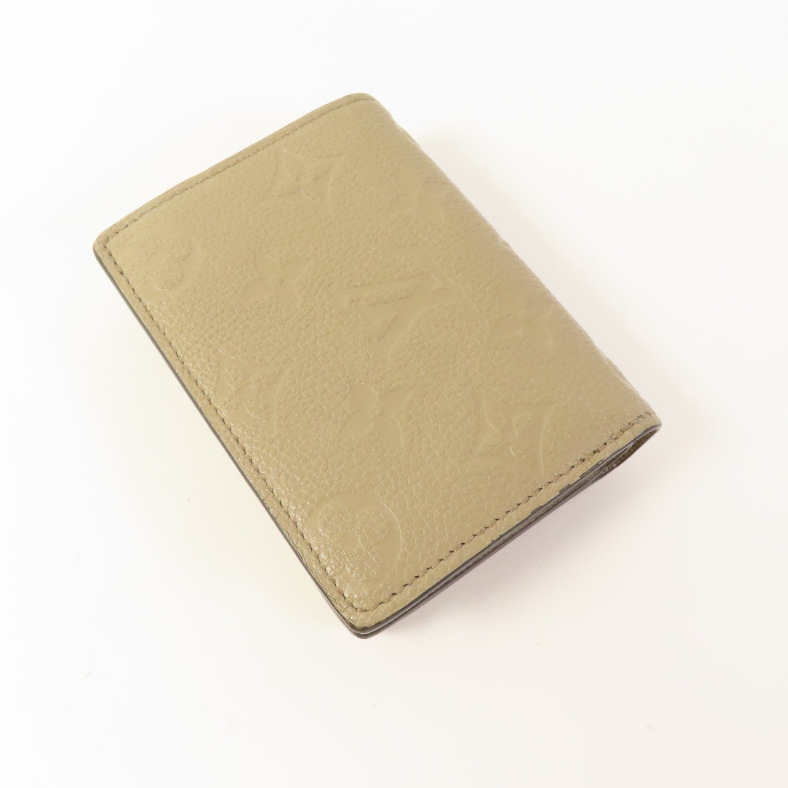 LOUIS VUITTON Clea Wallet Monogram-Empreinte Beige M80152