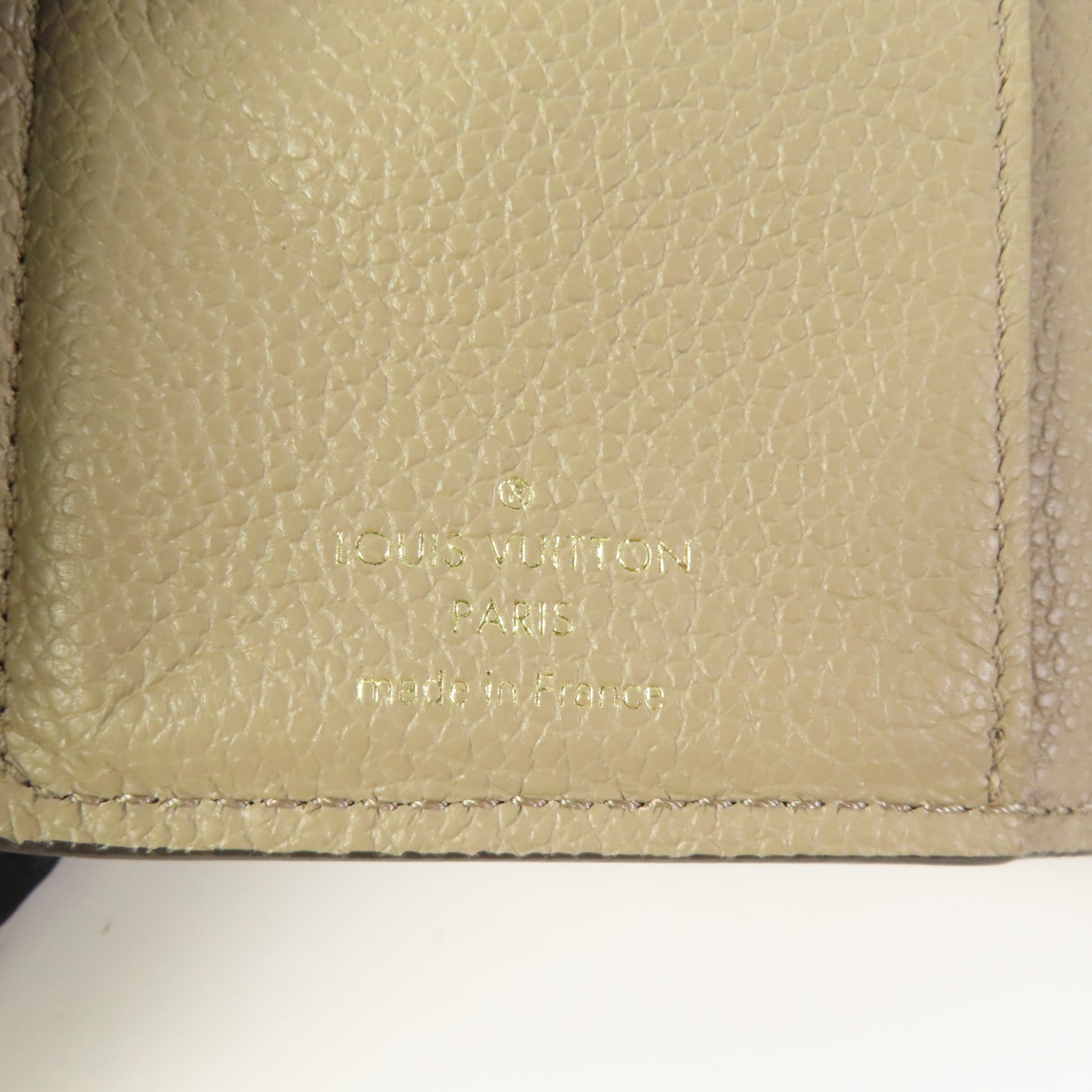 LOUIS VUITTON Clea Wallet Monogram-Empreinte Beige M80152