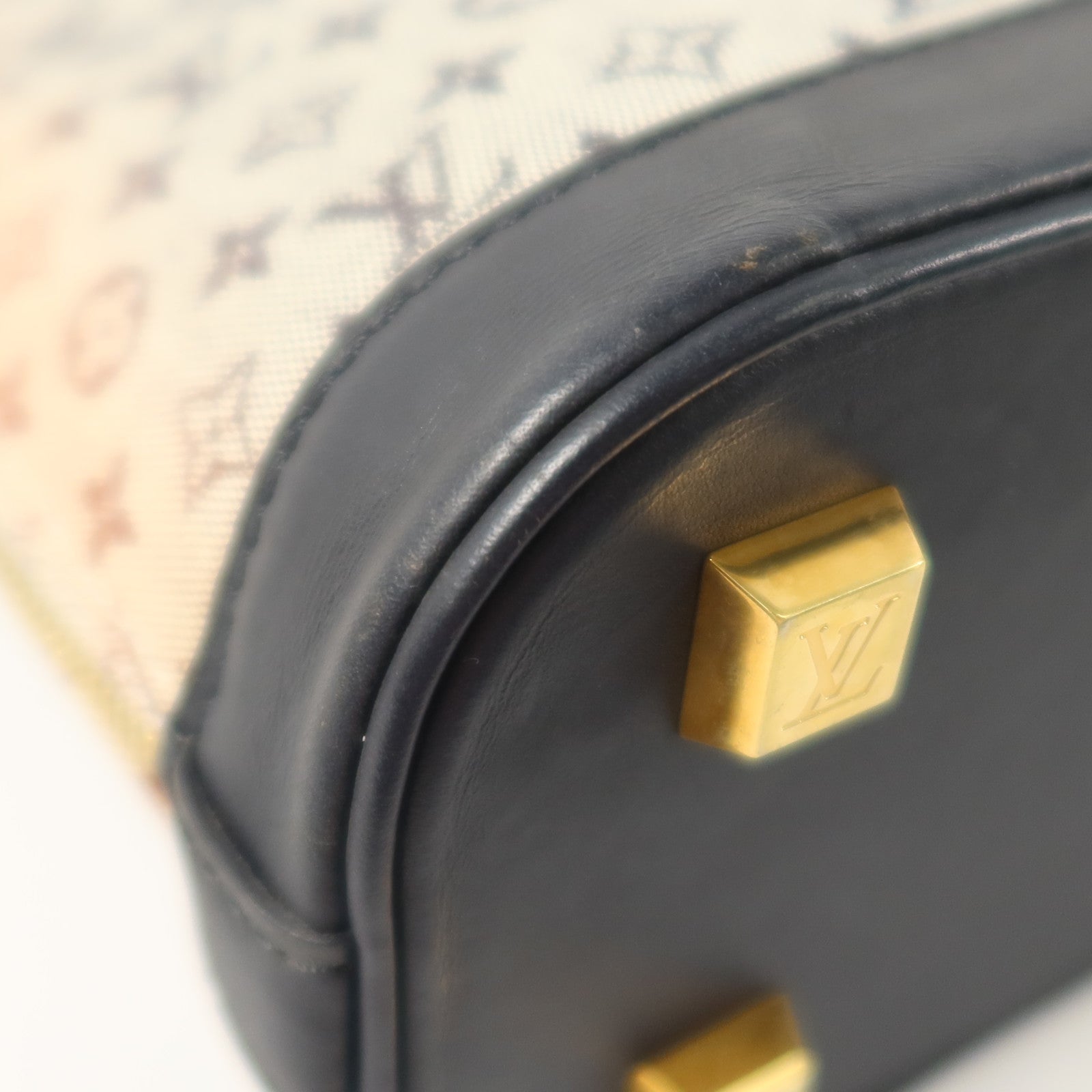 LOUIS VUITTON Monogram Mini Lin Alma Haut金扣手挽袋