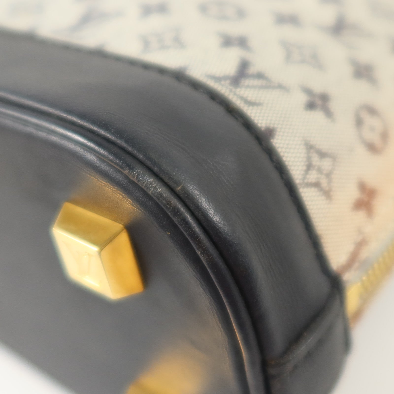 LOUIS VUITTON Monogram Mini Lin Alma Haut金扣手挽袋