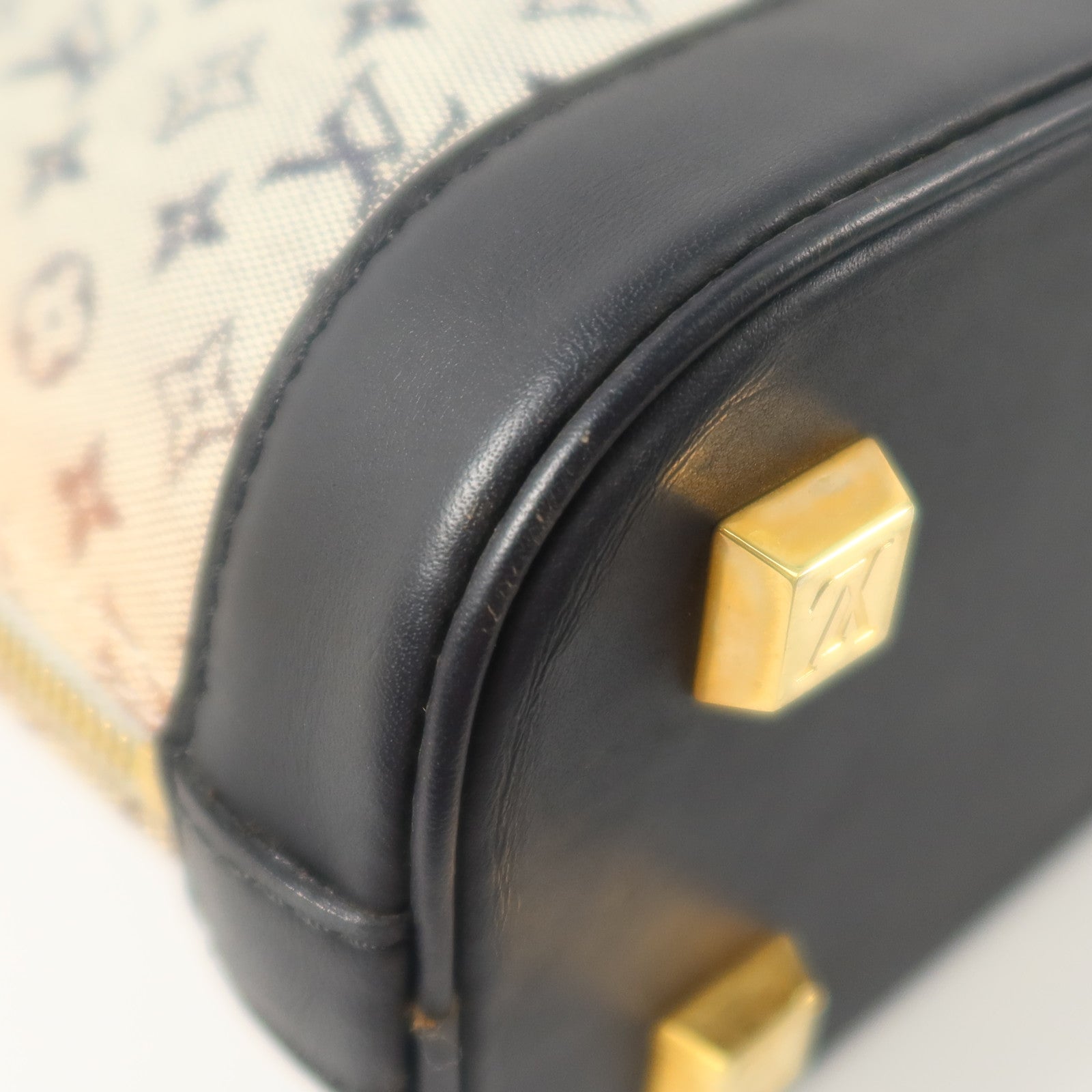 LOUIS VUITTON Monogram Mini Lin Alma Haut金扣手挽袋
