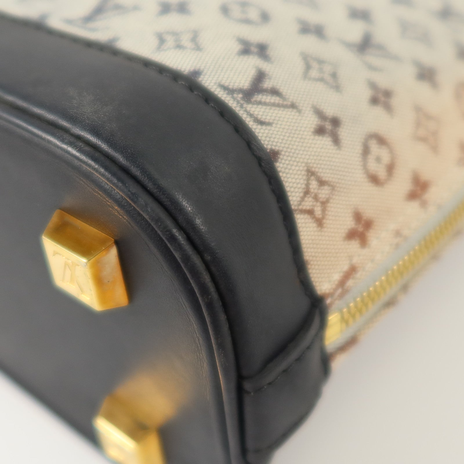 LOUIS VUITTON Monogram Mini Lin Alma Haut金扣手挽袋