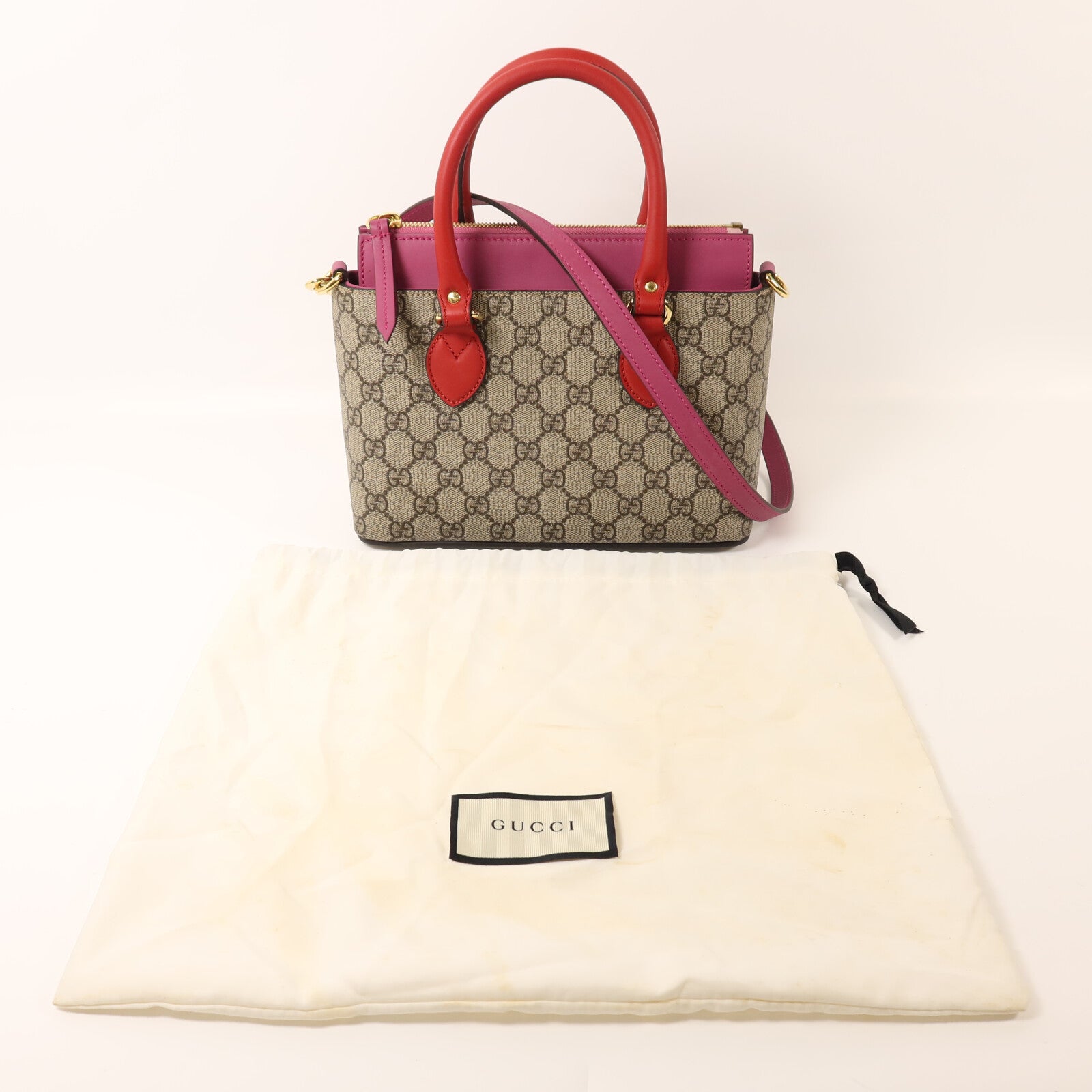 GUCCI 塗層帆布GG Supreme Mini Zip Bag金扣手挽肩背兩用袋