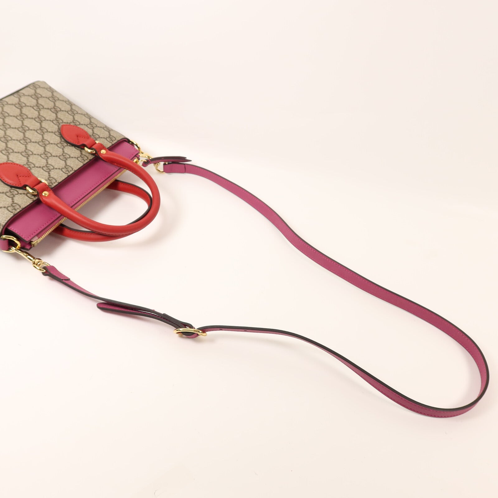 GUCCI 塗層帆布GG Supreme Mini Zip Bag金扣手挽肩背兩用袋