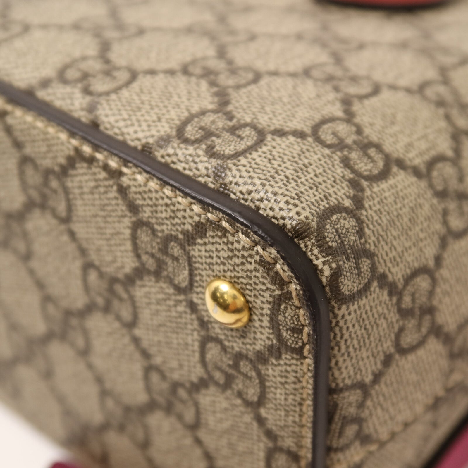 GUCCI 塗層帆布GG Supreme Mini Zip Bag金扣手挽肩背兩用袋