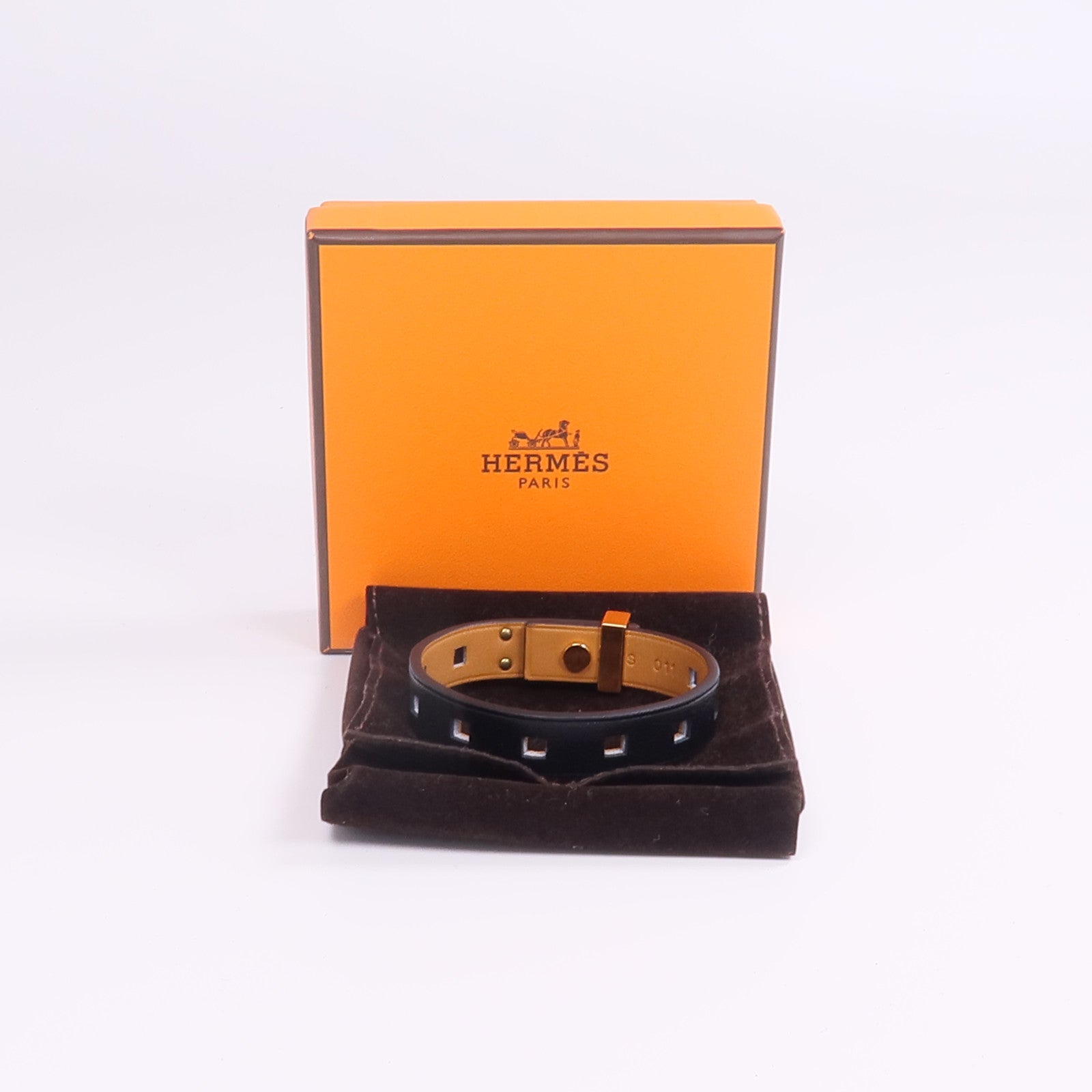HERMES Evercolor皮革Mini Dog Clous金扣手帶Noir