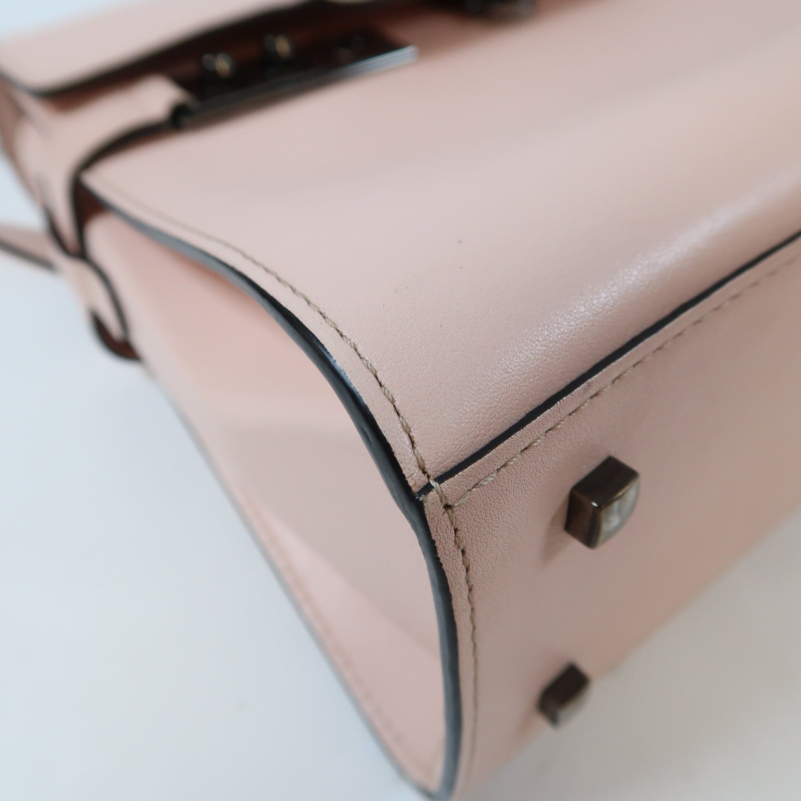 Delvaux 羊皮皮革Delvaux Tempete黑扣手挽肩背兩用袋粉紅色