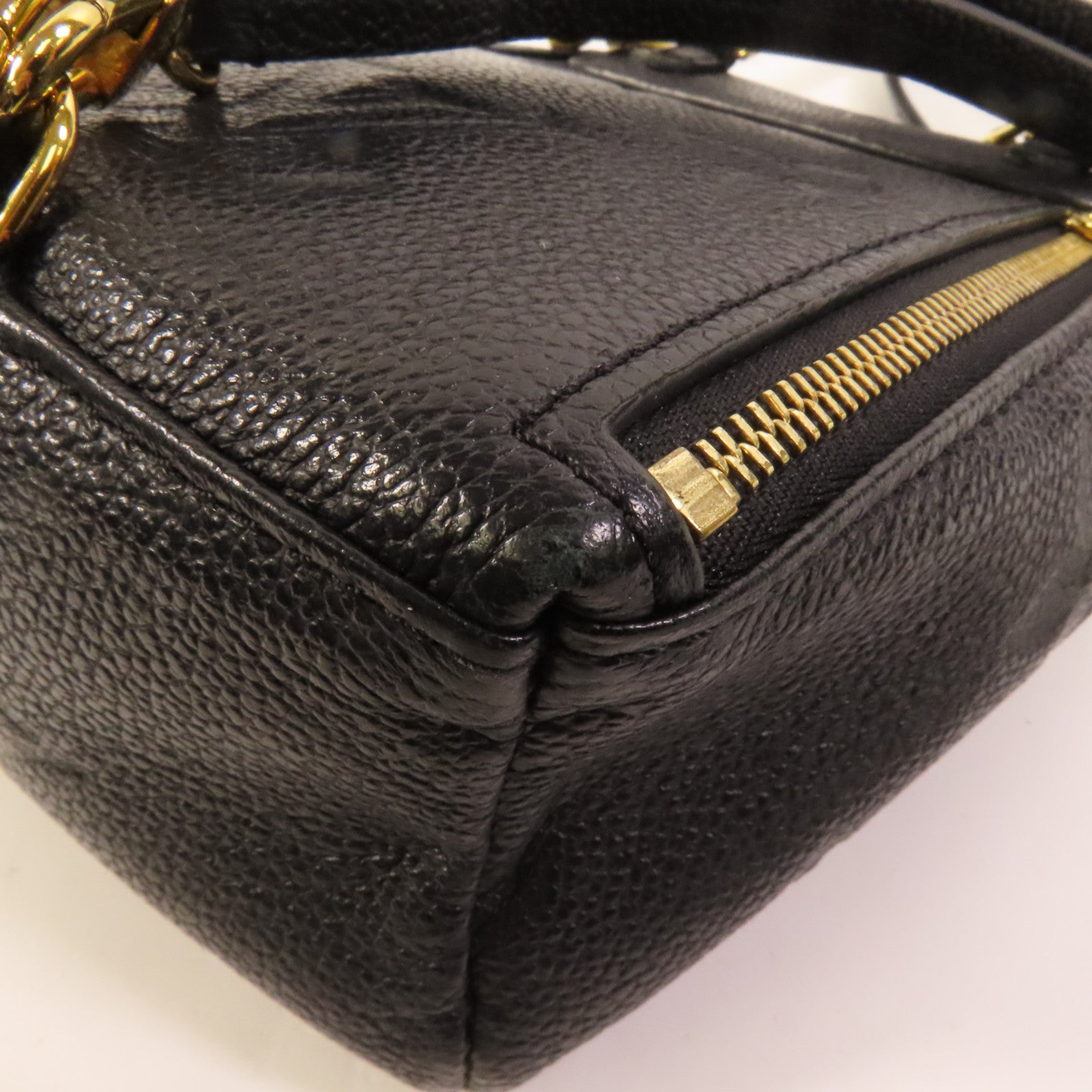 LOUIS VUITTON Monogram Empreinte Tiny Backpack金扣背包