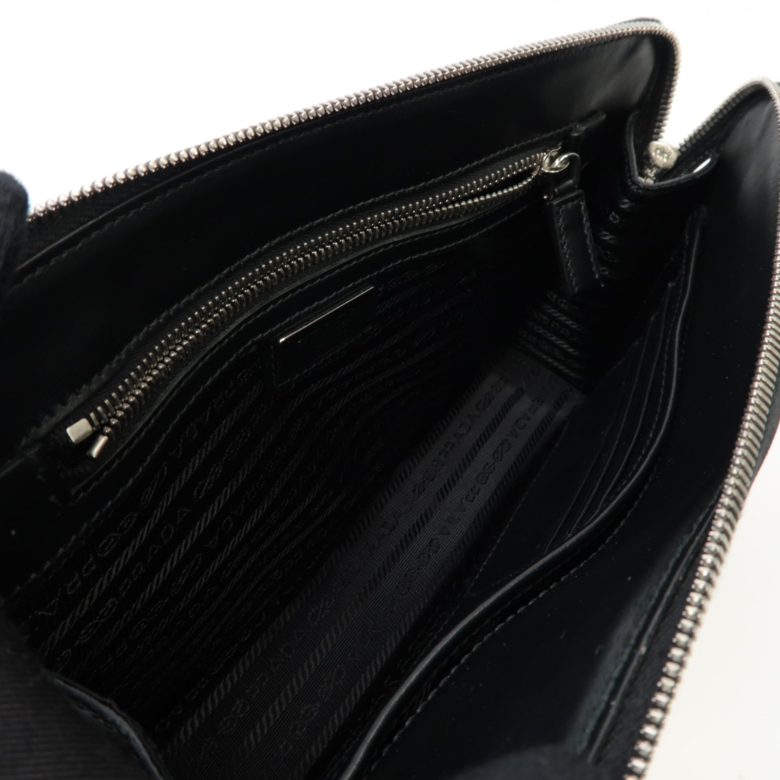 PRADA 牛皮皮革Zipped Clutch銀扣手拿包黑色