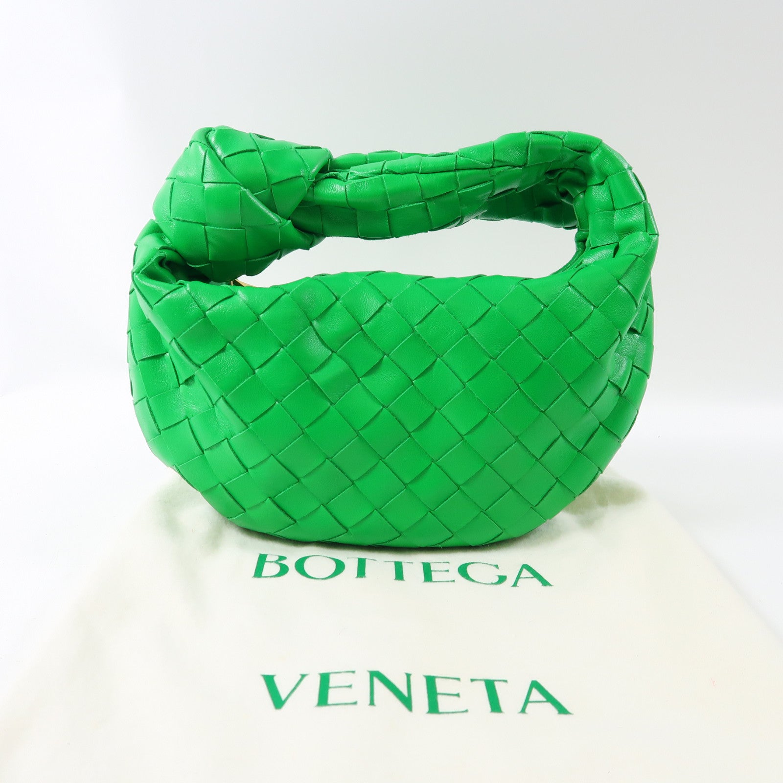 BOTTEGA VENETA 皮革Mini Jodie金扣手挽袋綠色