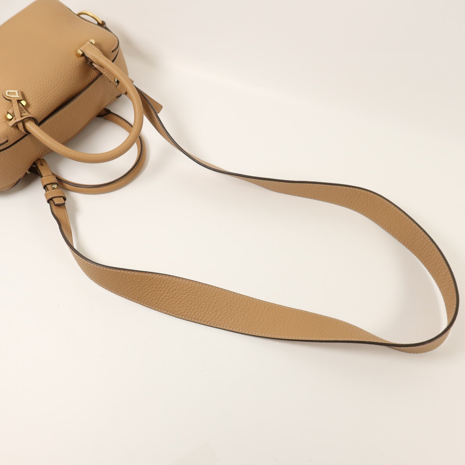 Delvaux 公牛皮革Cool Box Mini金扣手挽肩背兩用袋