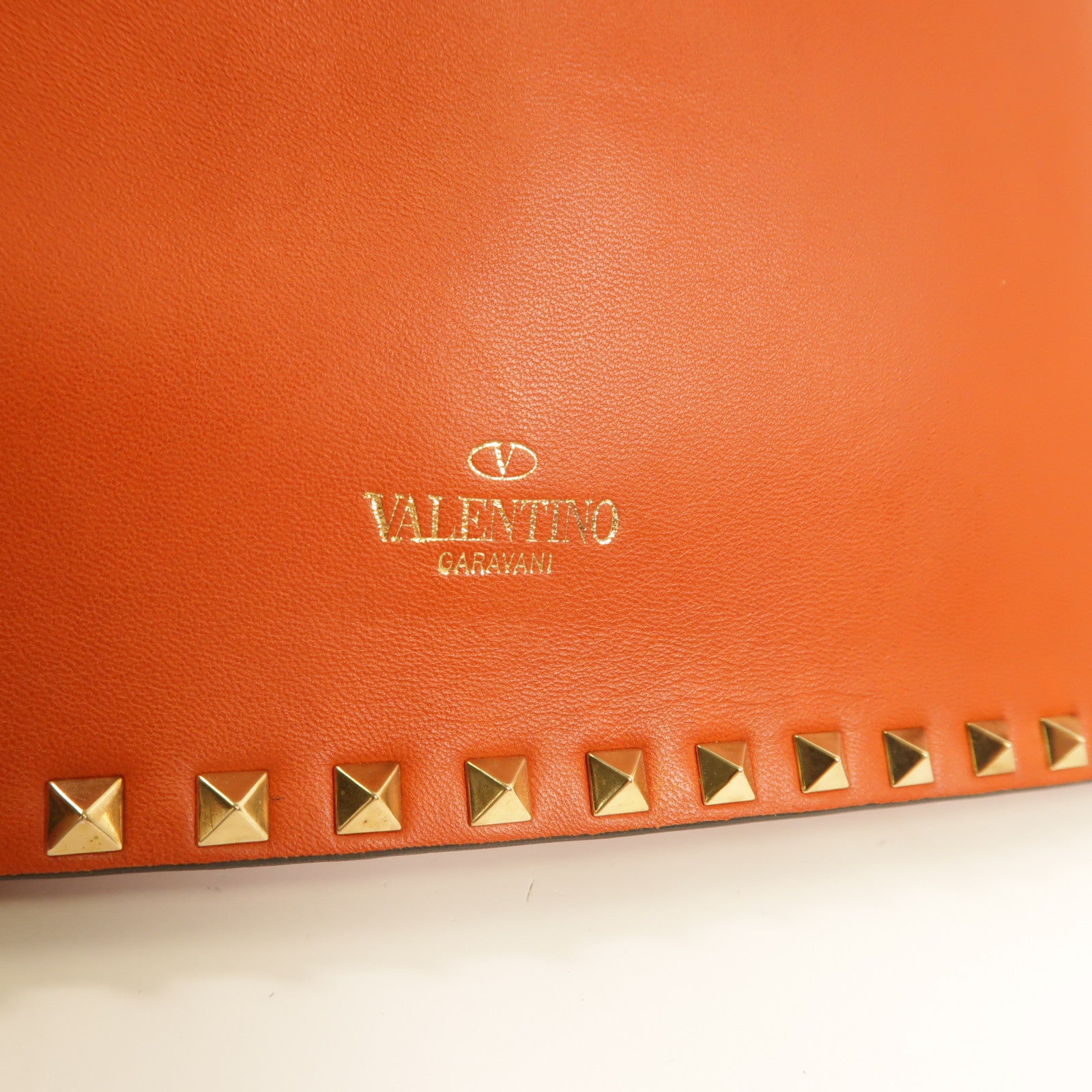 Valentino 牛皮皮革Clutch金扣手拿包