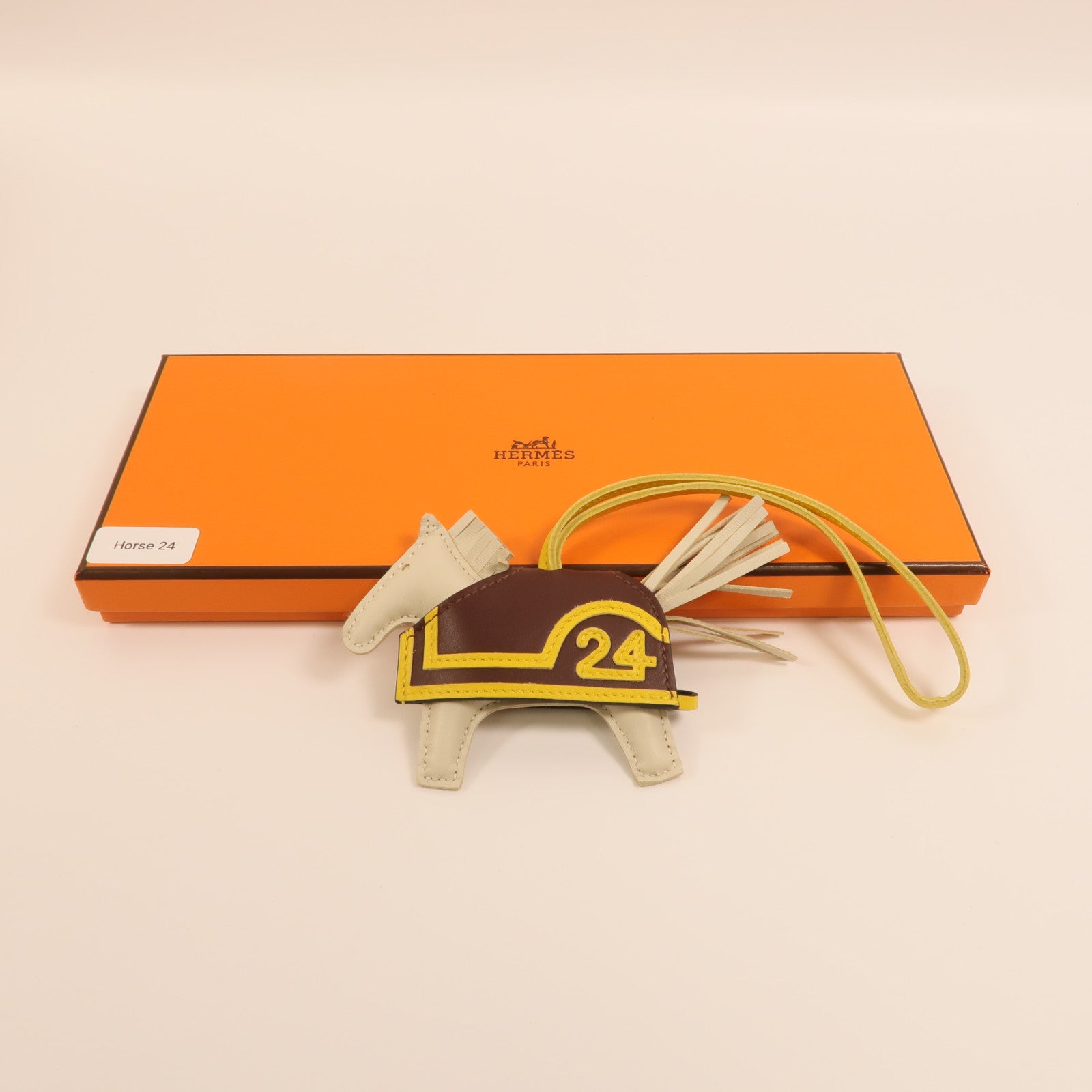 HERMES Milo/Swift皮革Rodeo Robeo 24 PM掛飾Craie/Terre/Jaune De Naples