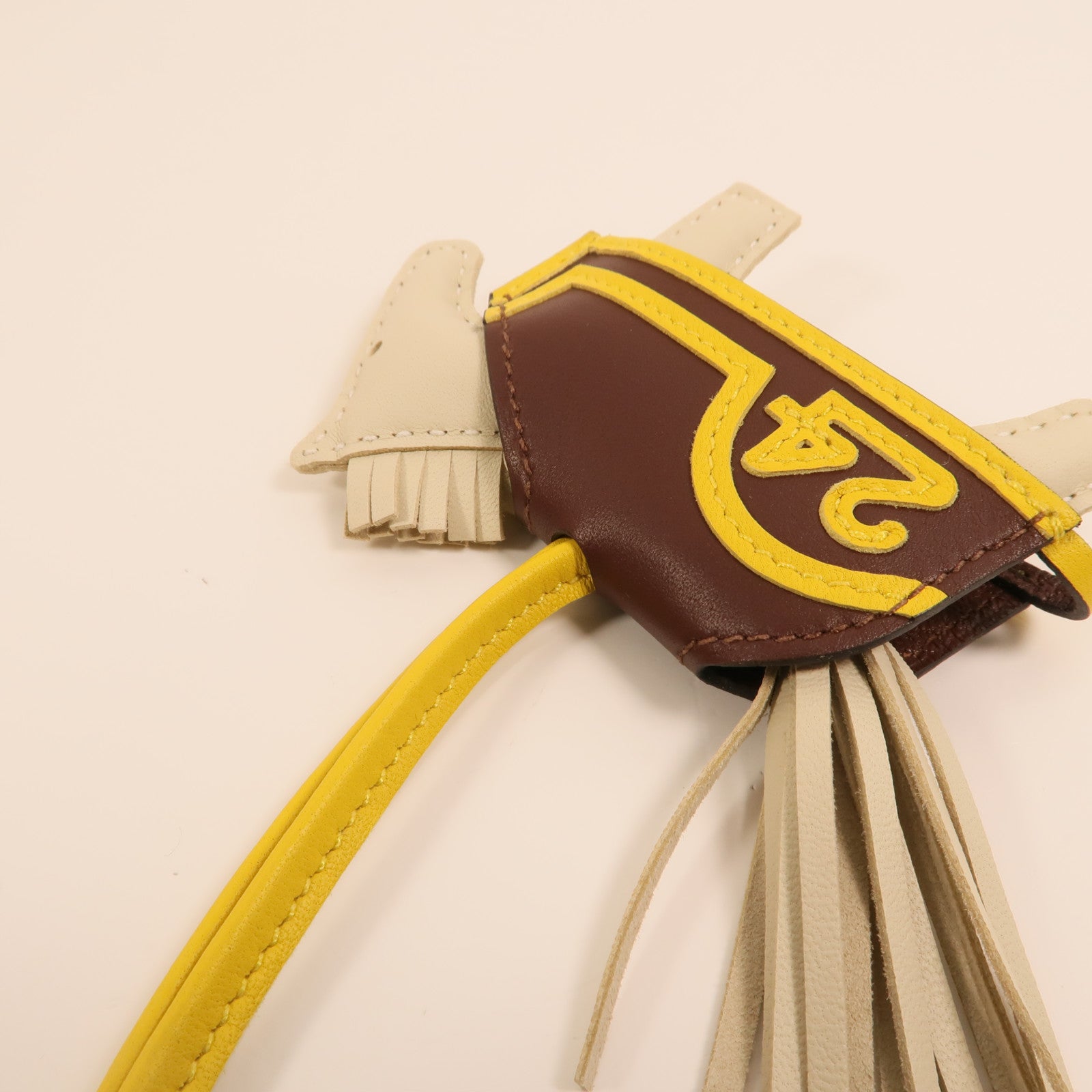 HERMES Milo/Swift皮革Rodeo Robeo 24 PM掛飾Craie/Terre/Jaune De Naples