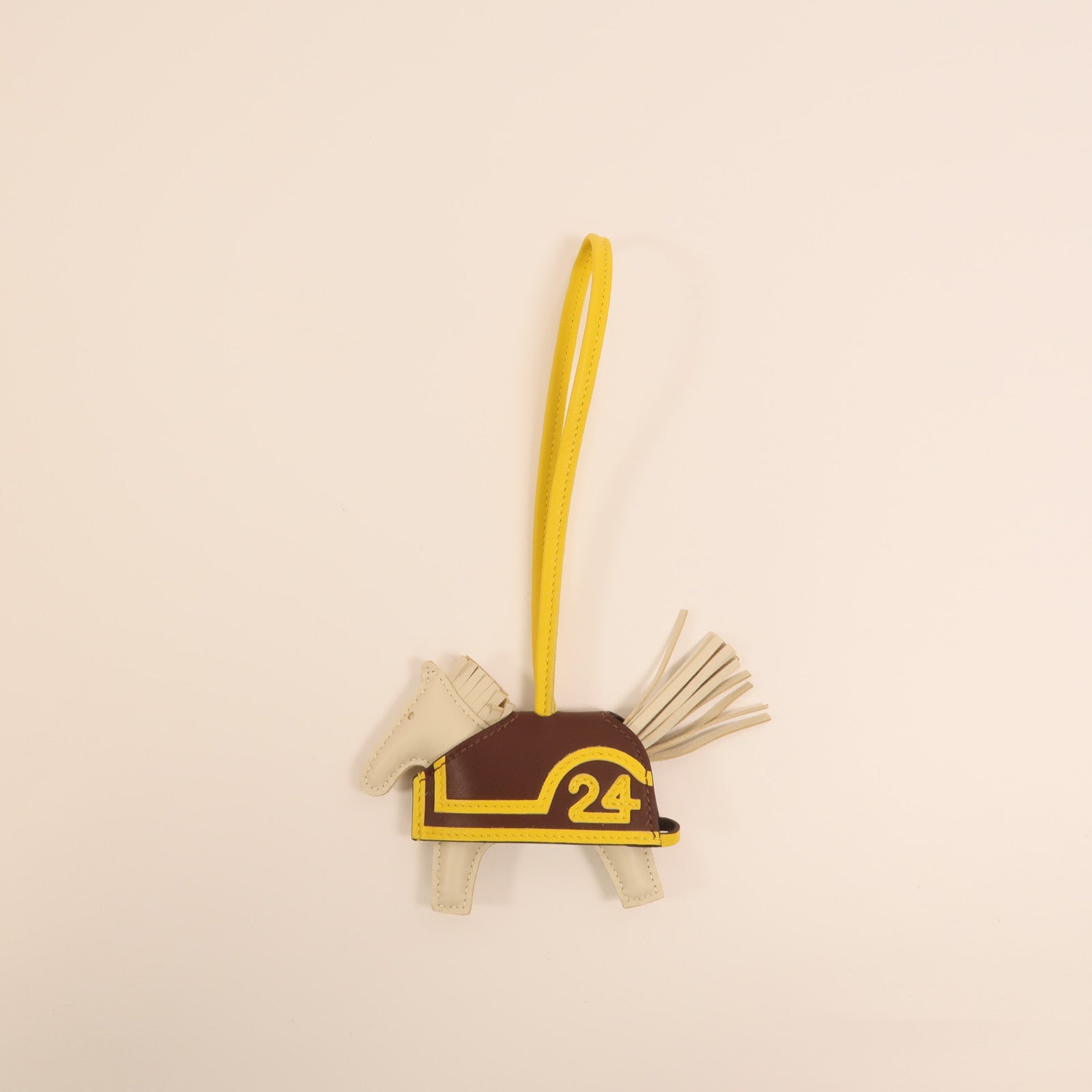 HERMES Milo/Swift皮革Rodeo Robeo 24 PM掛飾Craie/Terre/Jaune De Naples