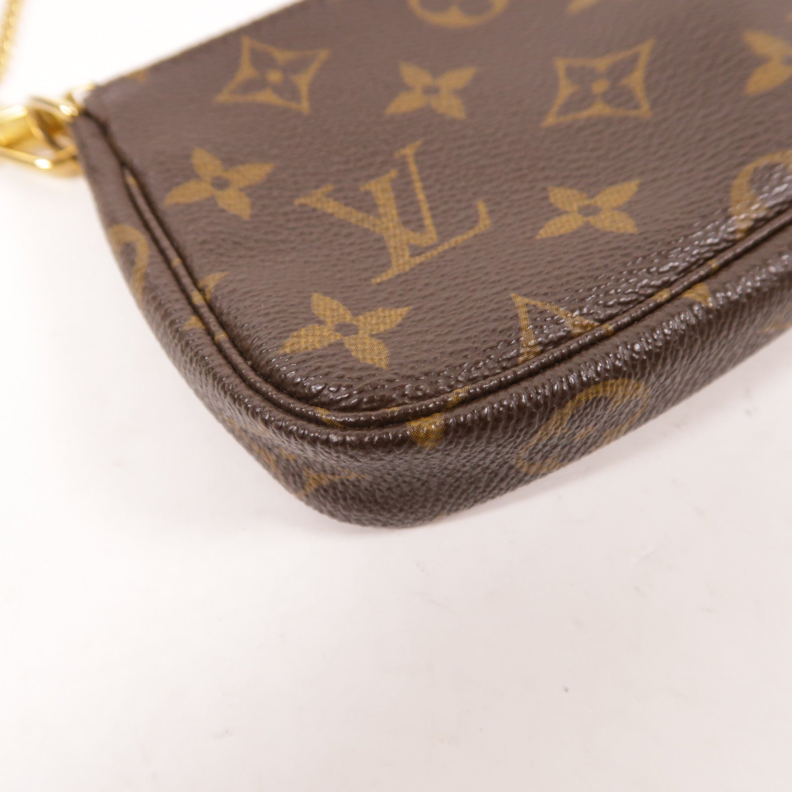LOUIS VUITTON Monogram Mini Pochette Accessoires金扣手挽袋棕色
