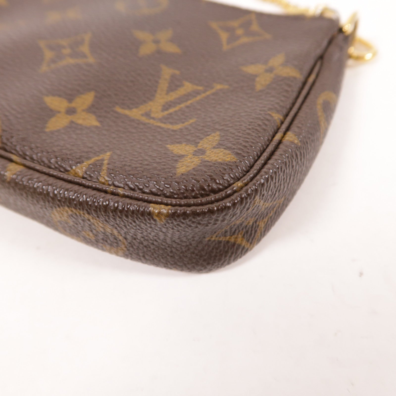 LOUIS VUITTON Monogram Mini Pochette Accessoires金扣手挽袋棕色