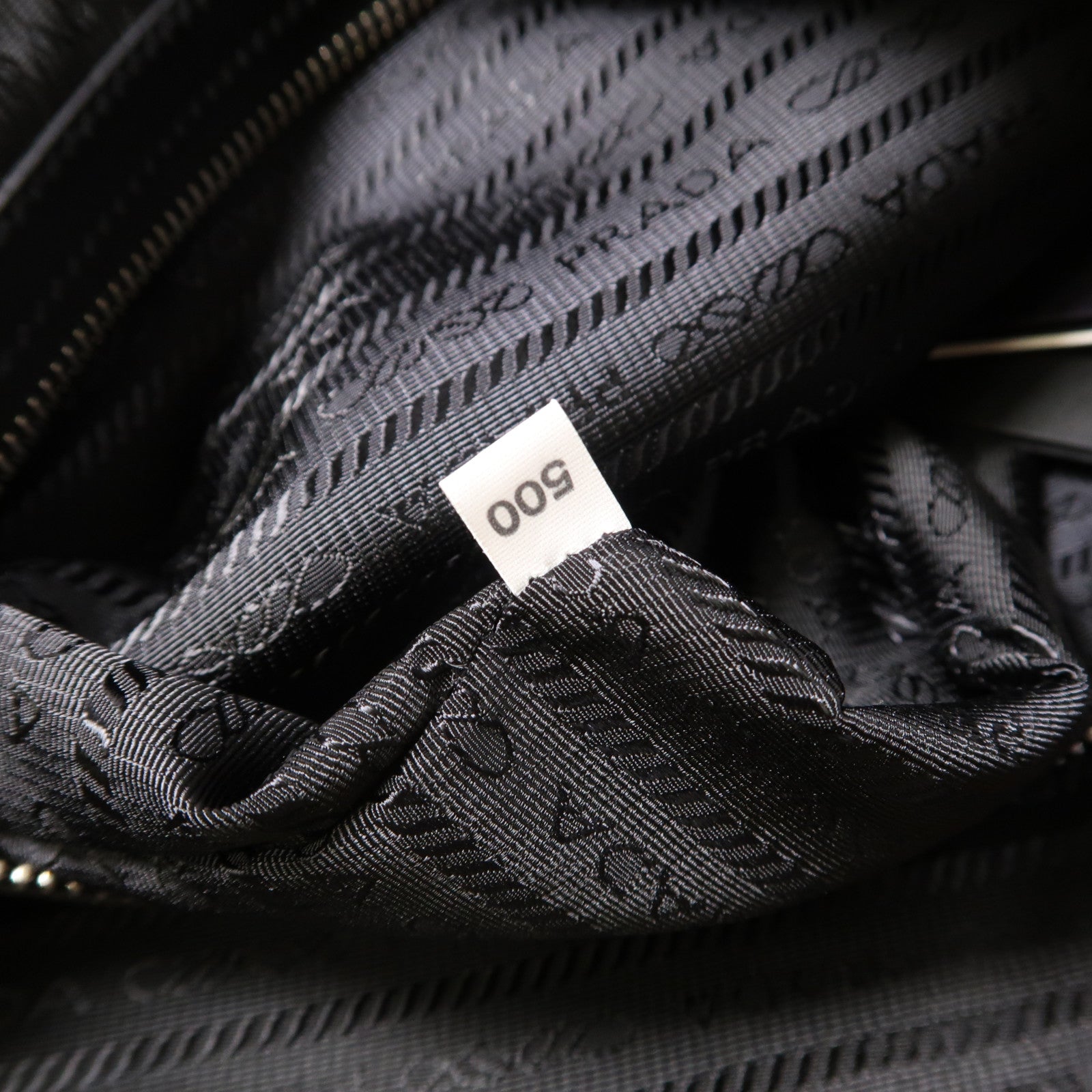 PRADA 牛皮皮革Triangle Bag銀扣肩背袋白色