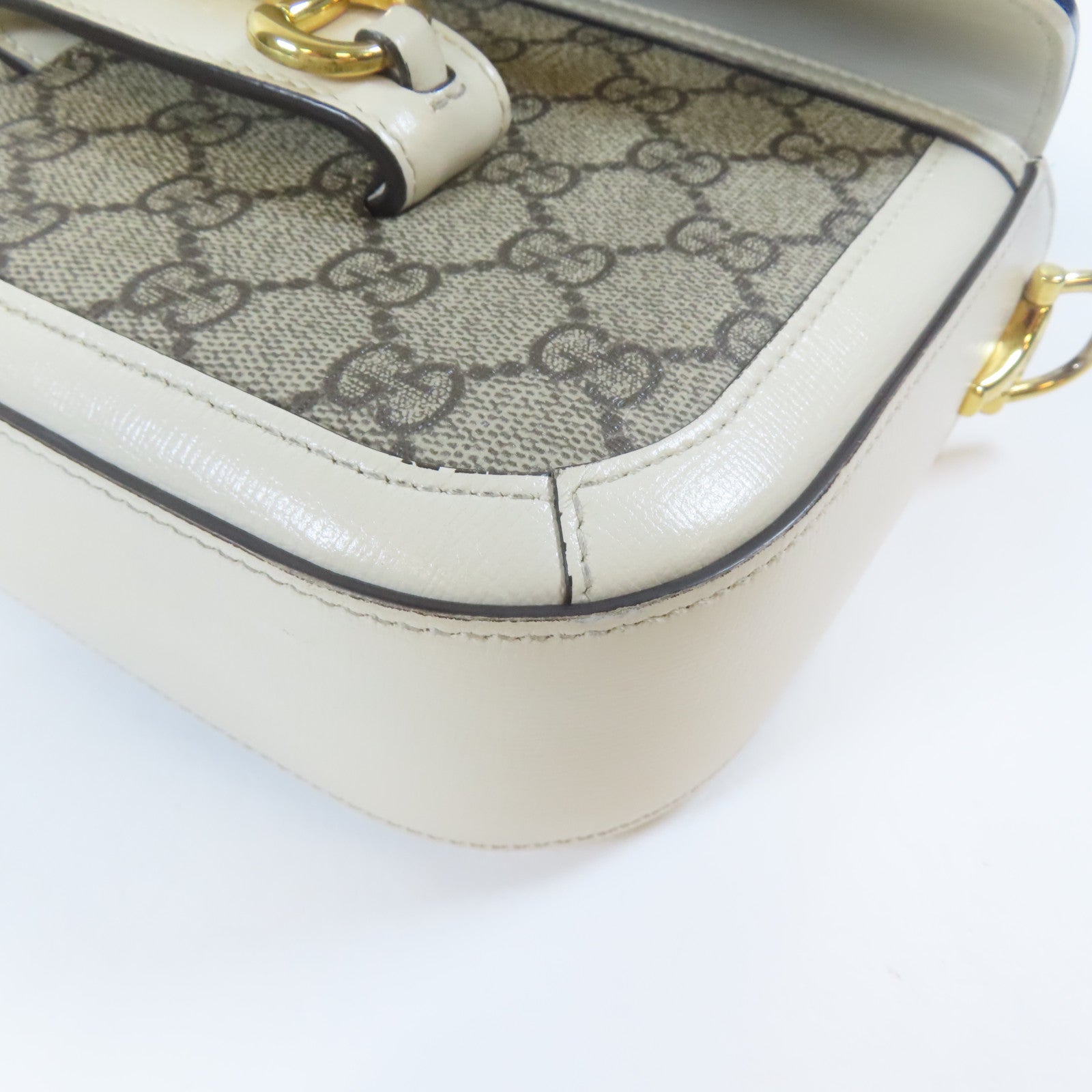 GUCCI 塗層帆布Horsebit 1955 Mini Bag金扣肩背袋白色/啡色