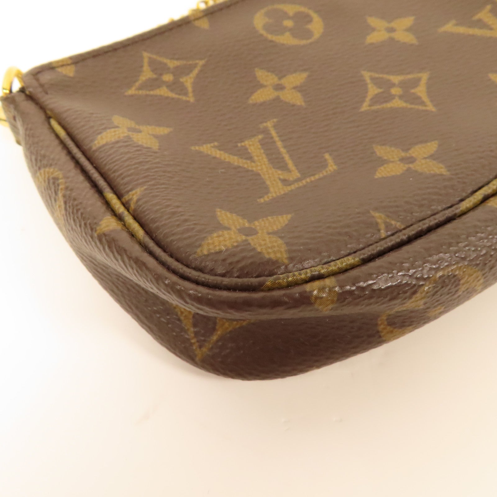 LOUIS VUITTON Monogram Mini Pochette Accessoires金扣手挽袋