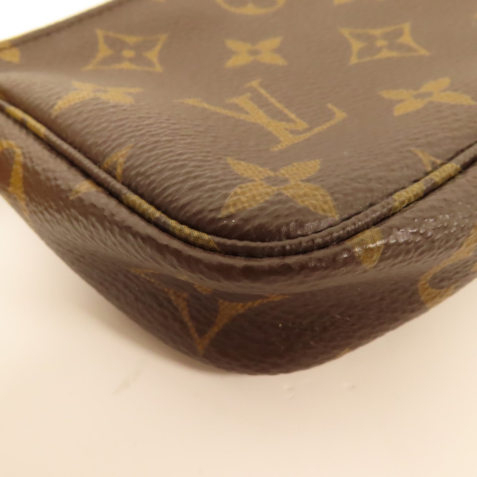 LOUIS VUITTON Monogram Mini Pochette Accessoires金扣手挽袋