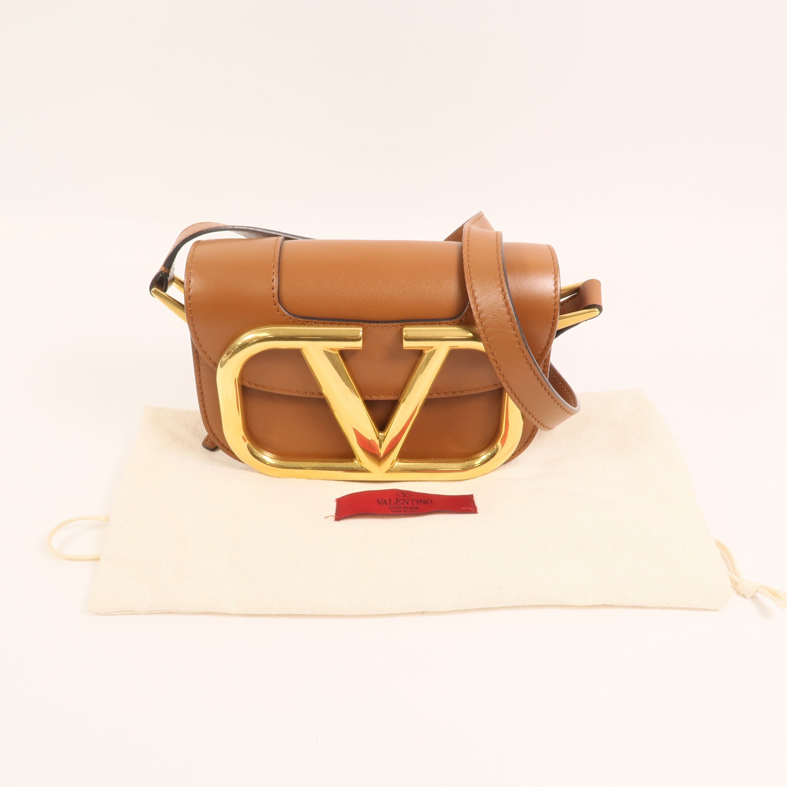Valentino 牛皮皮革Super V金扣肩背袋