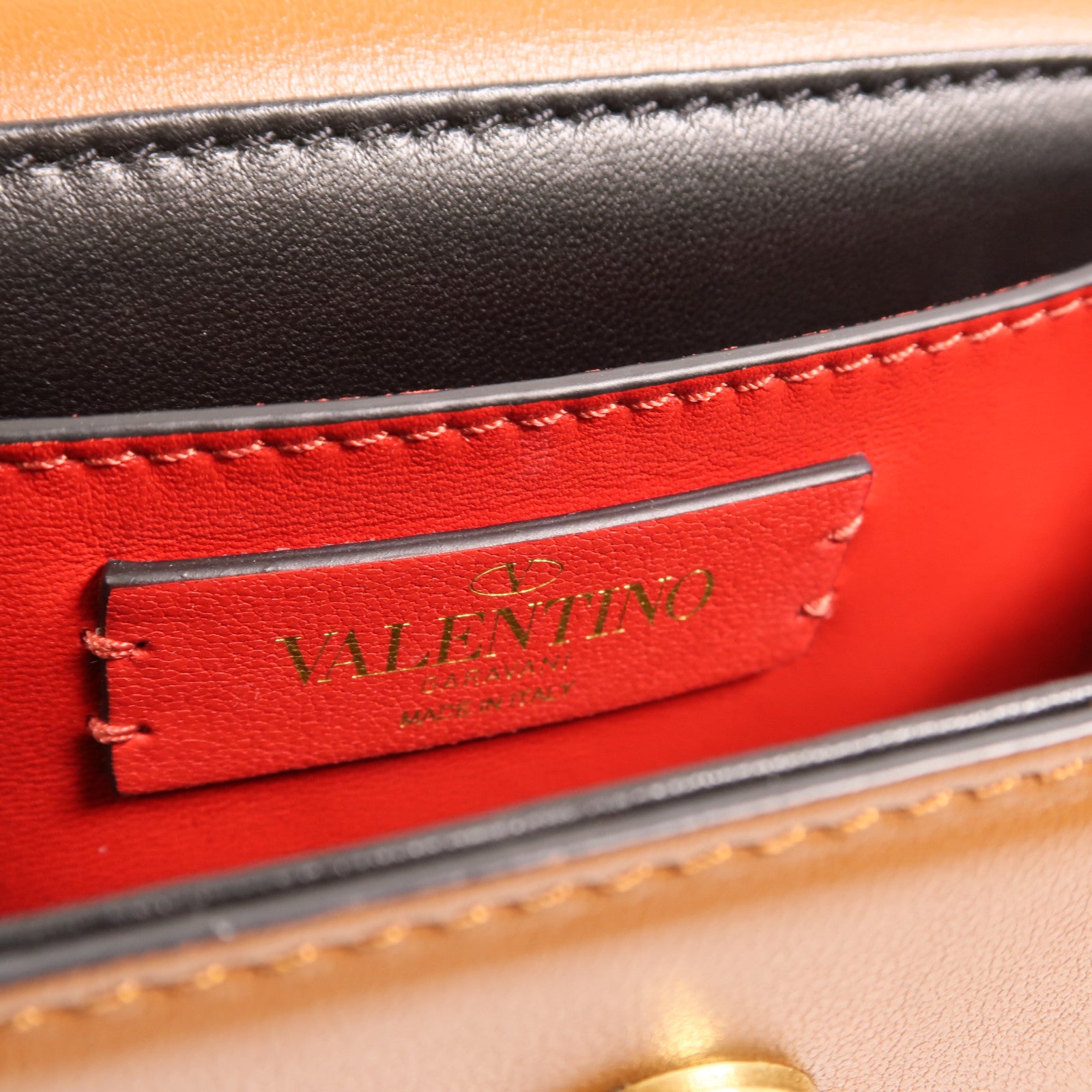 Valentino 牛皮皮革Super V金扣肩背袋