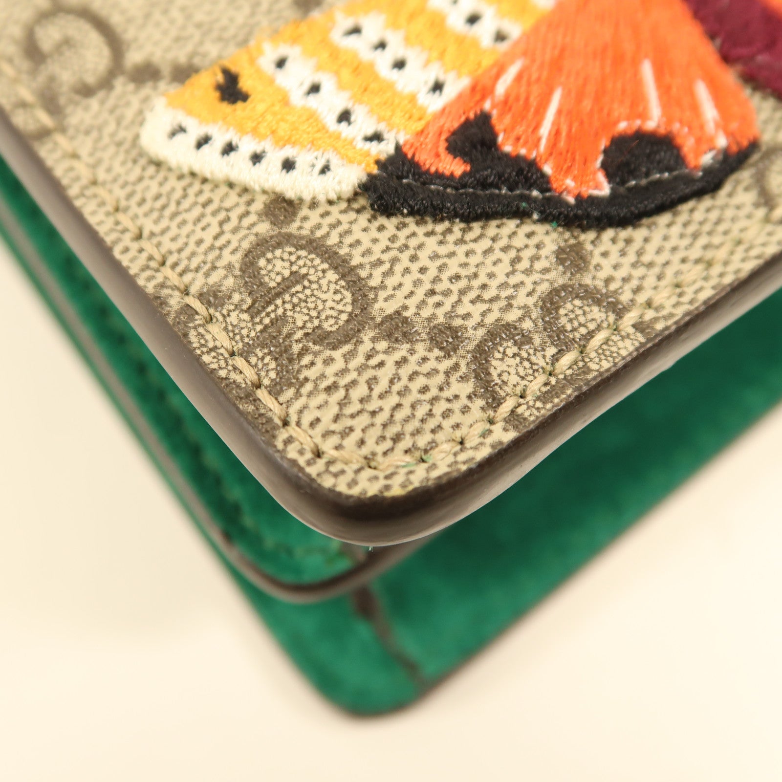 GUCCI 塗層帆布GG Supreme Dionysus銀扣鏈帶肩背袋