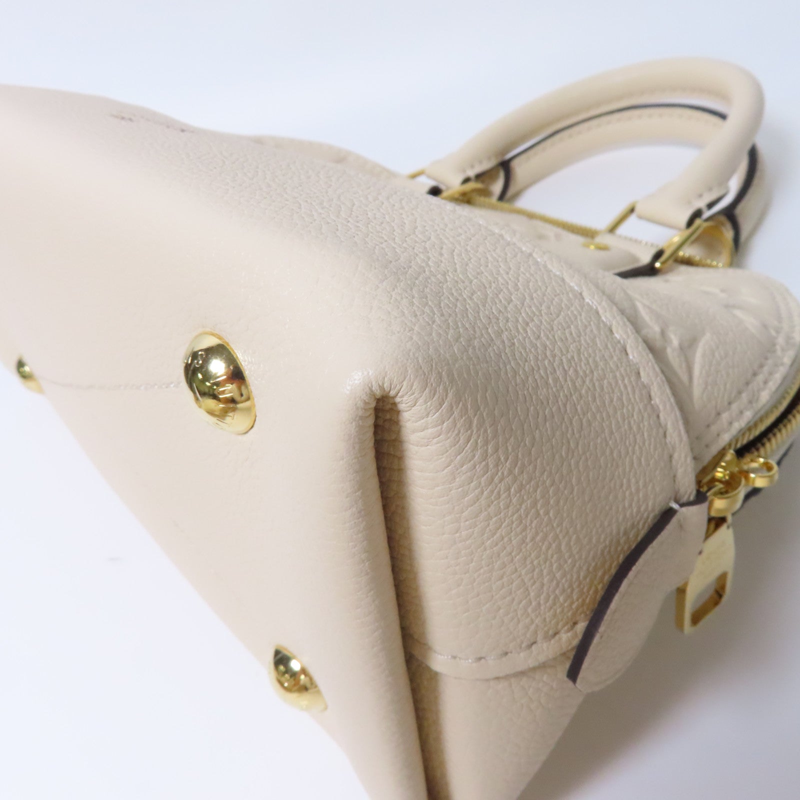 LOUIS VUITTON Monogram Empreinte Neo Alma BB金扣手挽肩背兩用袋米色