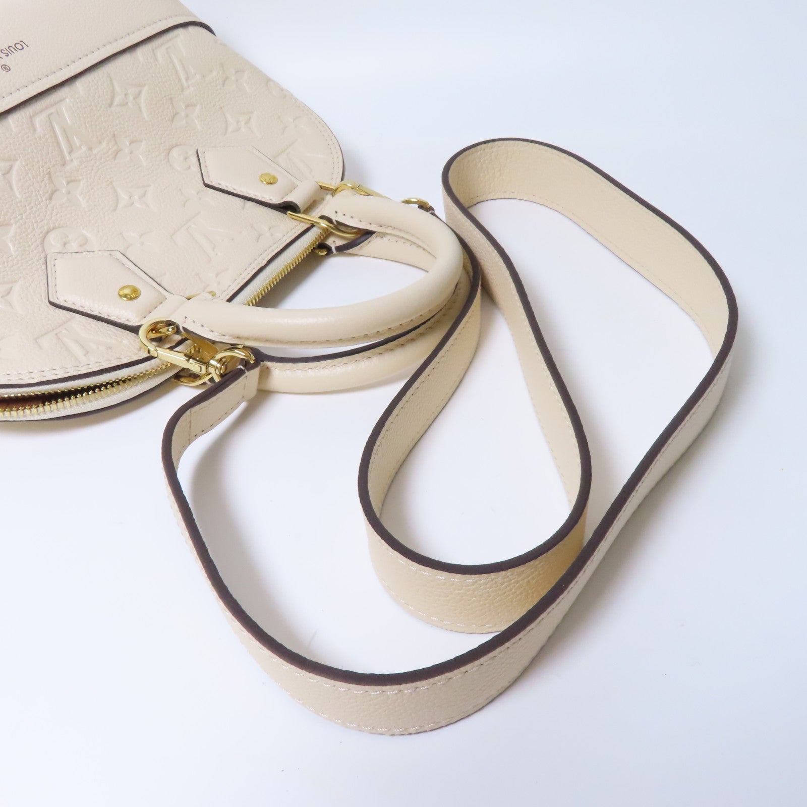 LOUIS VUITTON Monogram Empreinte Neo Alma BB金扣手挽肩背兩用袋米色