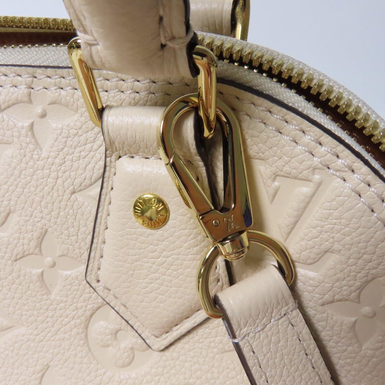 LOUIS VUITTON Monogram Empreinte Neo Alma BB金扣手挽肩背兩用袋米色