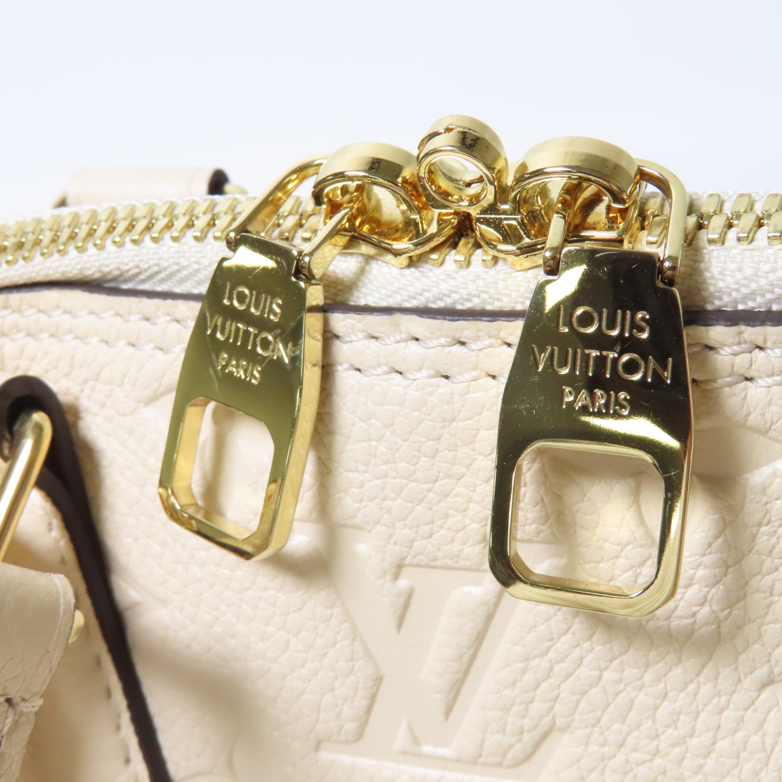 LOUIS VUITTON Monogram Empreinte Neo Alma BB金扣手挽肩背兩用袋米色