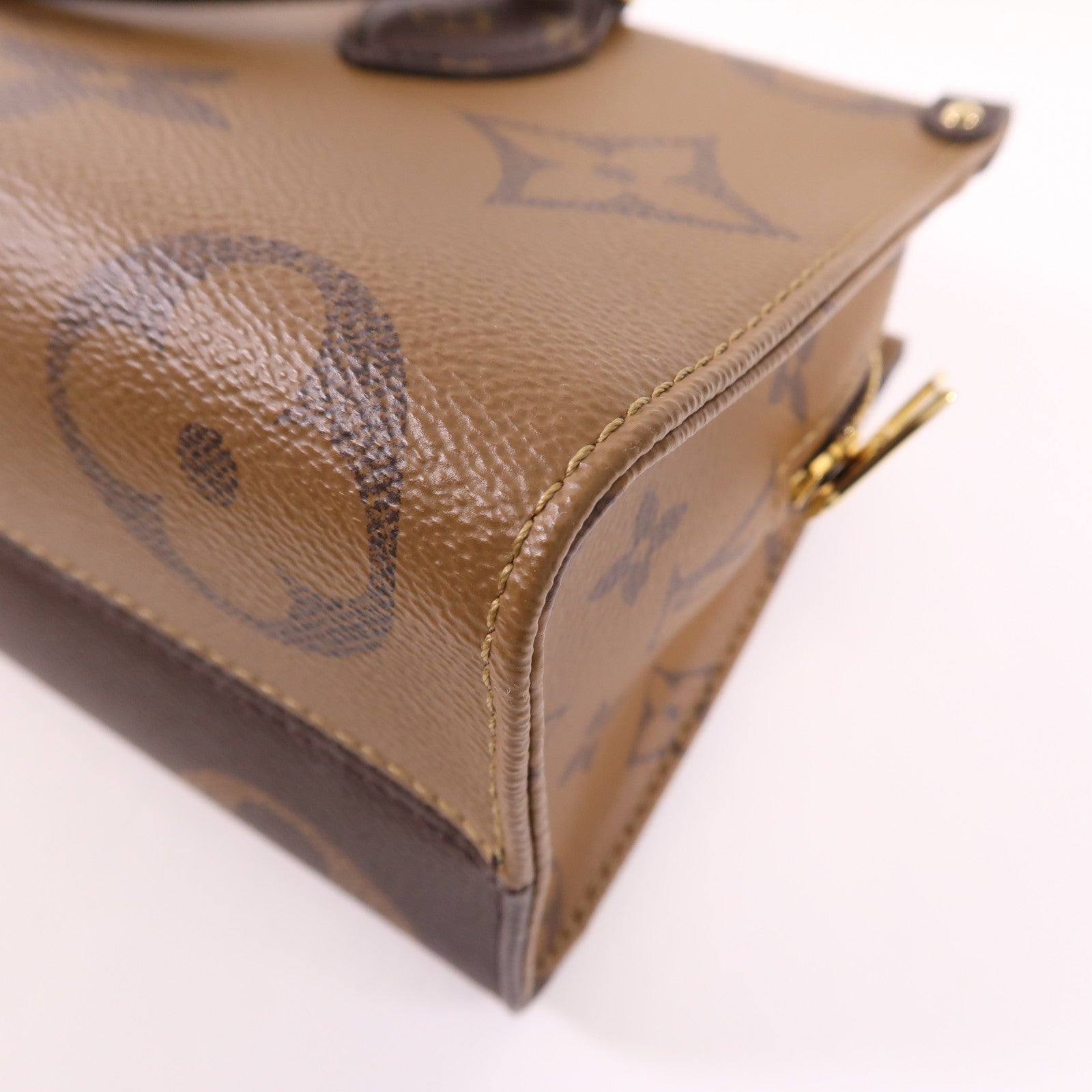 LOUIS VUITTON Monogram Giant Reverse On The Go East West金扣手挽肩背兩用袋